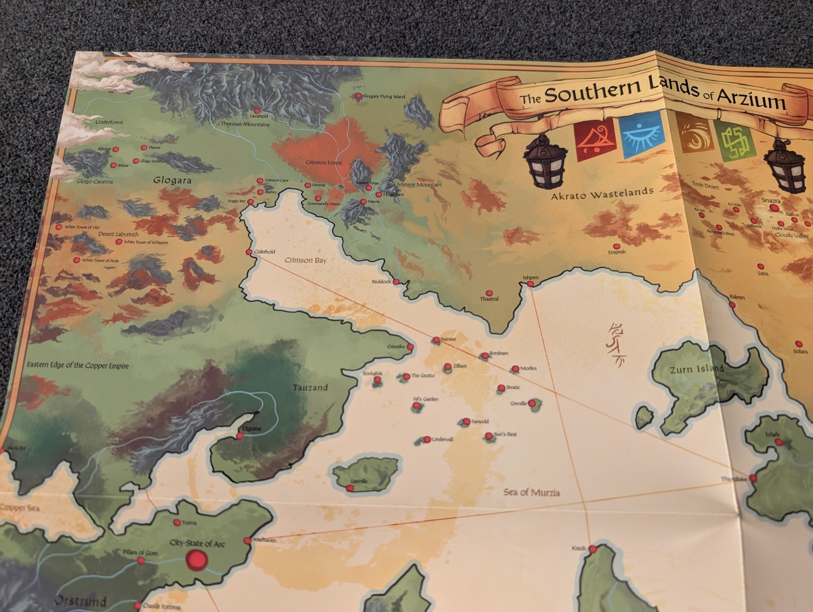 The Southern Lands of Arzium 22×16 Poster, Creature Caravan Deluxe: Red Raven