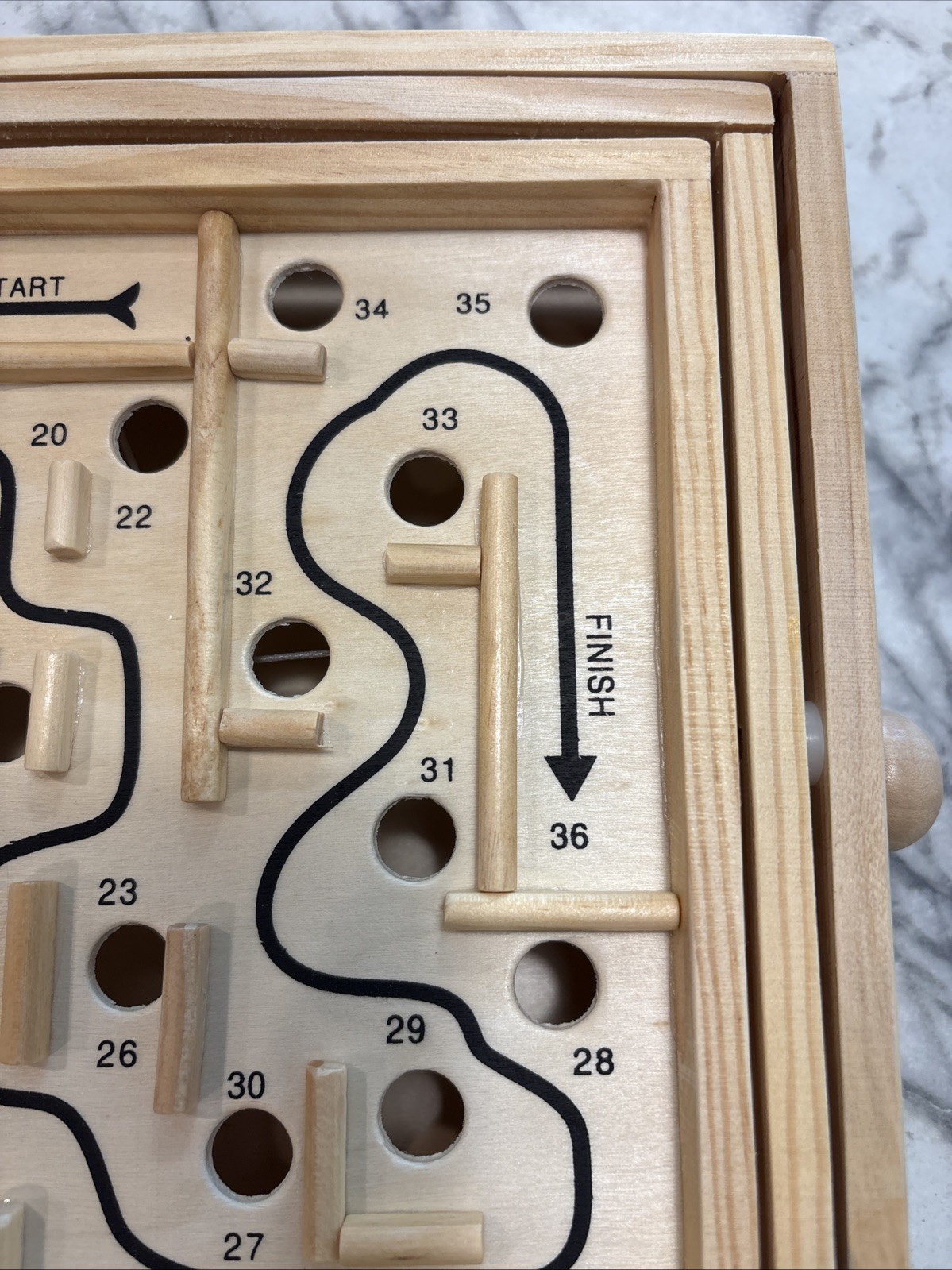 Labyrinth wood tabletop game.