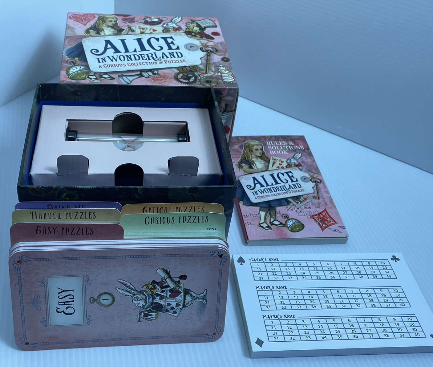 Sterling Innovation Alice in Wonderland Collection of Puzzles Trivia Game Open