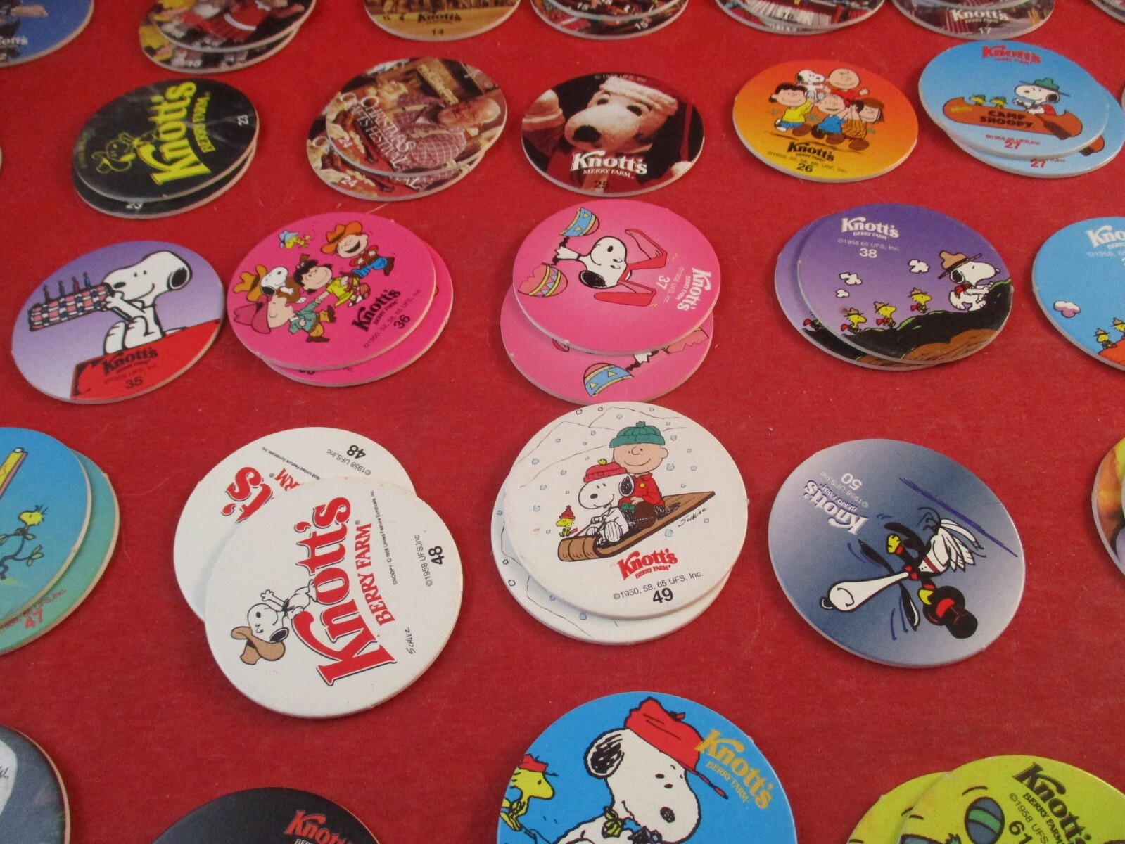 Set of 75 Knott’s Berry Farm Pog Rides & Peanuts Charlie Brown Snoopy w/Slammers