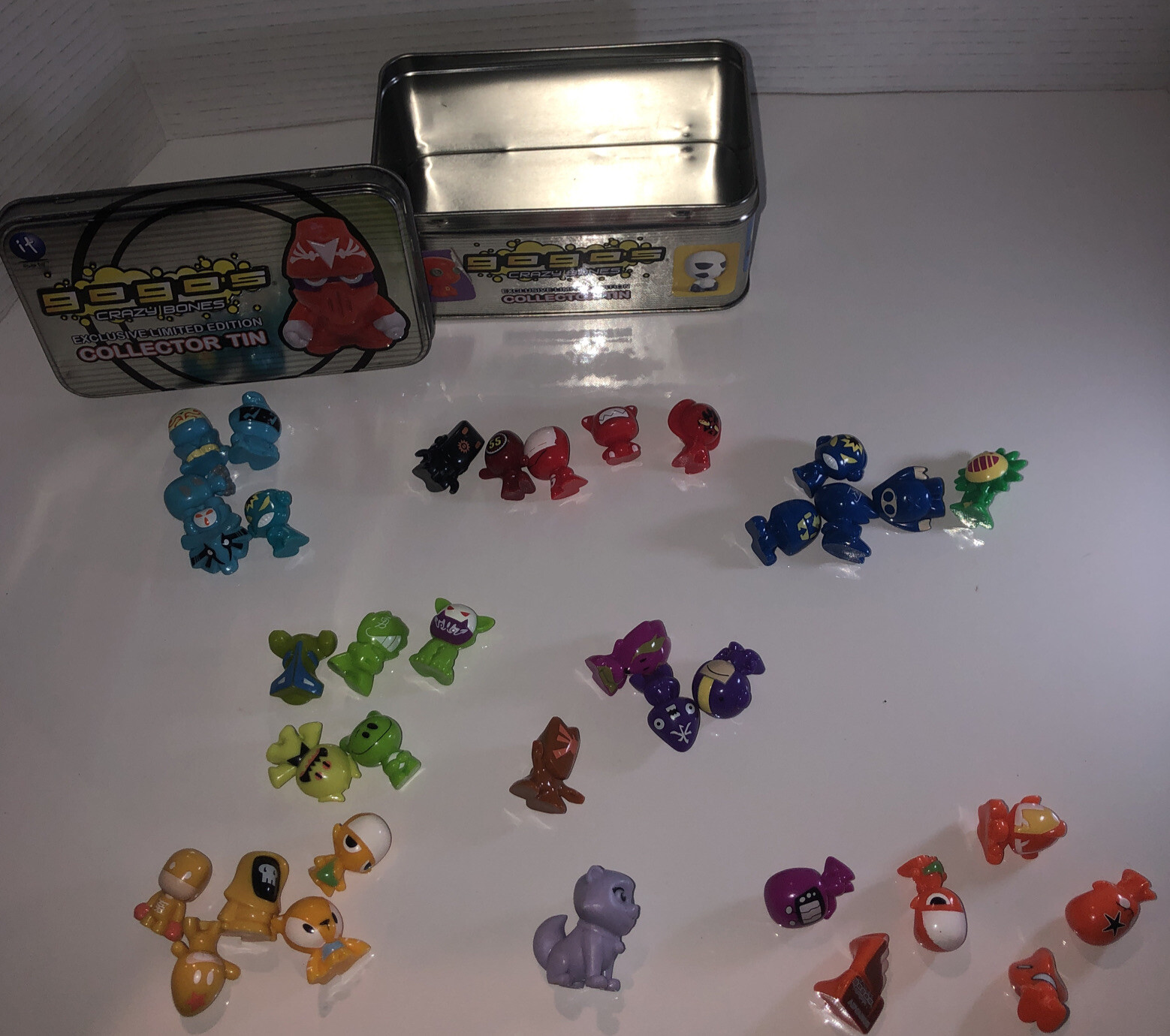 Gogos’ Crazy Bones Figures x 35 Lot Bundle and tin with stickers on it. see pic.
