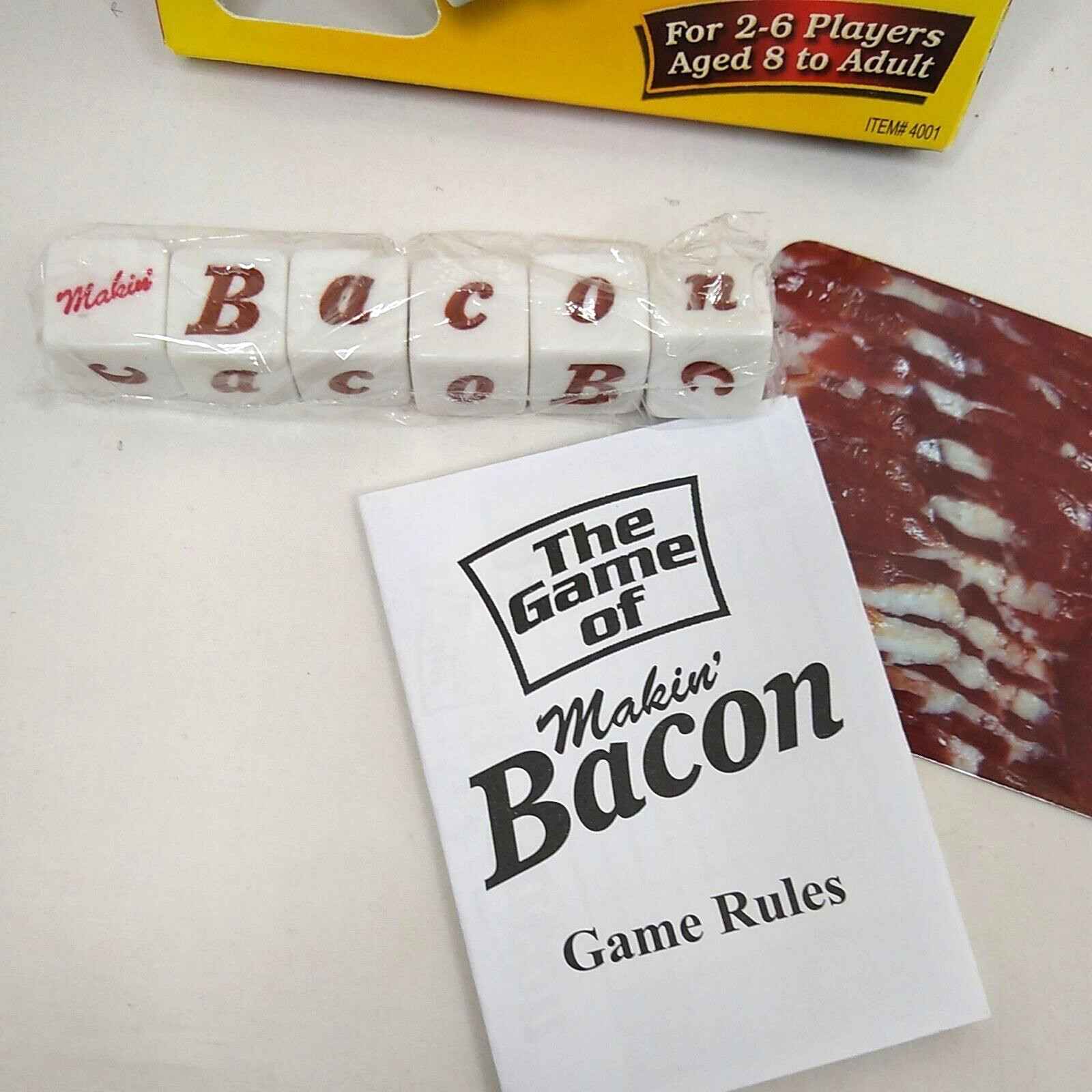 Makin’ Bacon Dice Game 2-6 Players Age 8+ Open box with some flaws