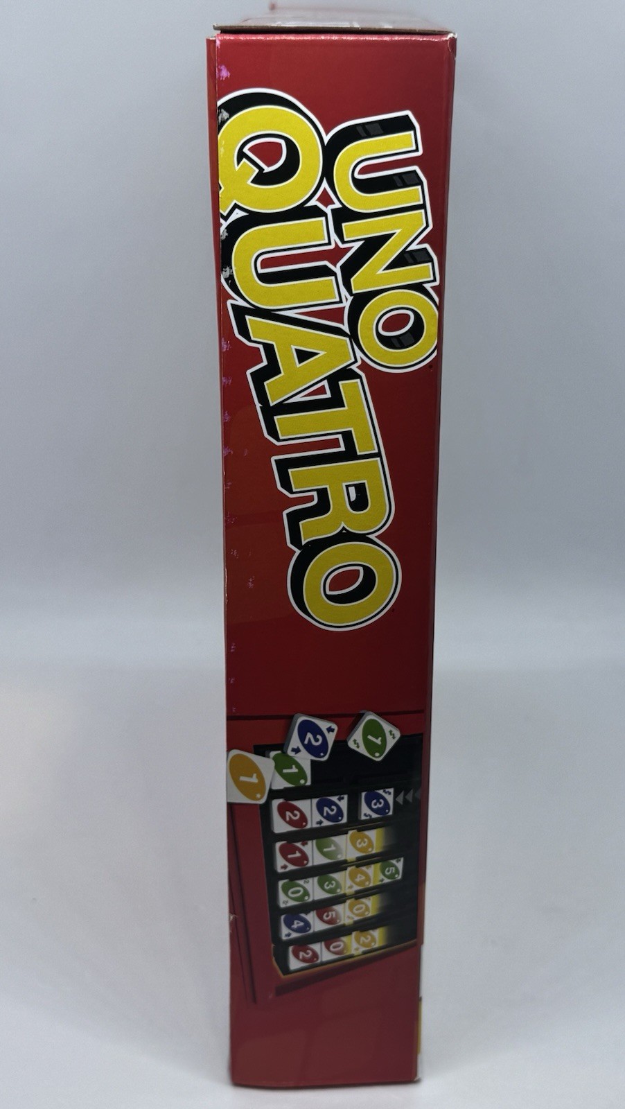 Mattel Games UNO Quatro Game with Colored Tiles & Plastic Grid for Family