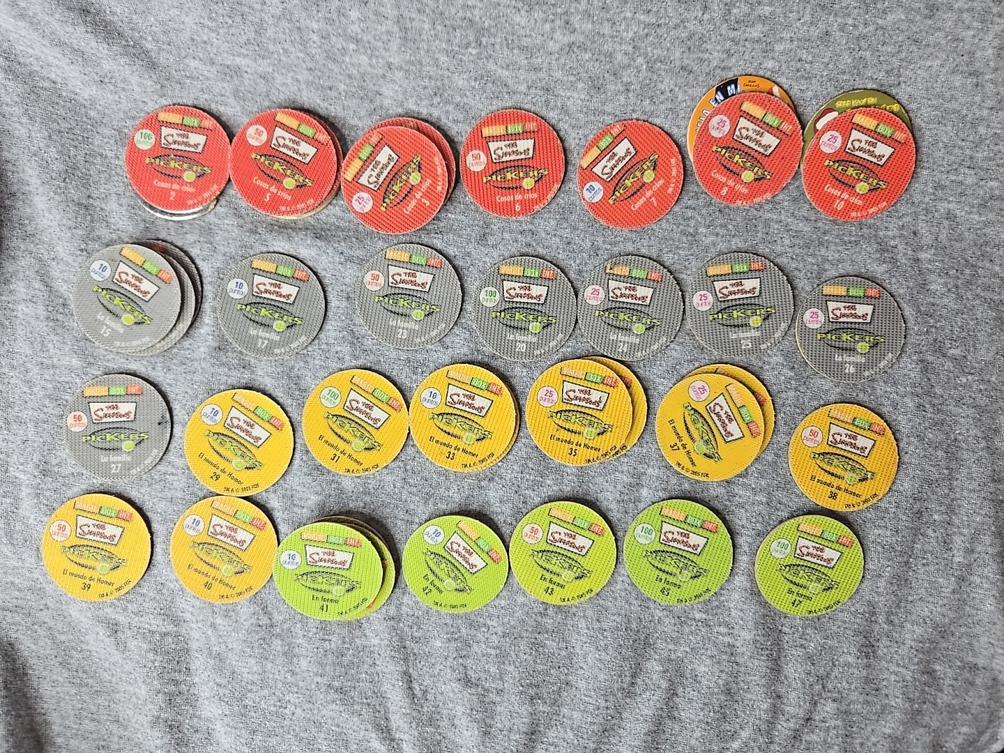 The Simpsons Pickers Lot Of 102 Pogs Tazos Magic Box 2005 Espanol / Ingles