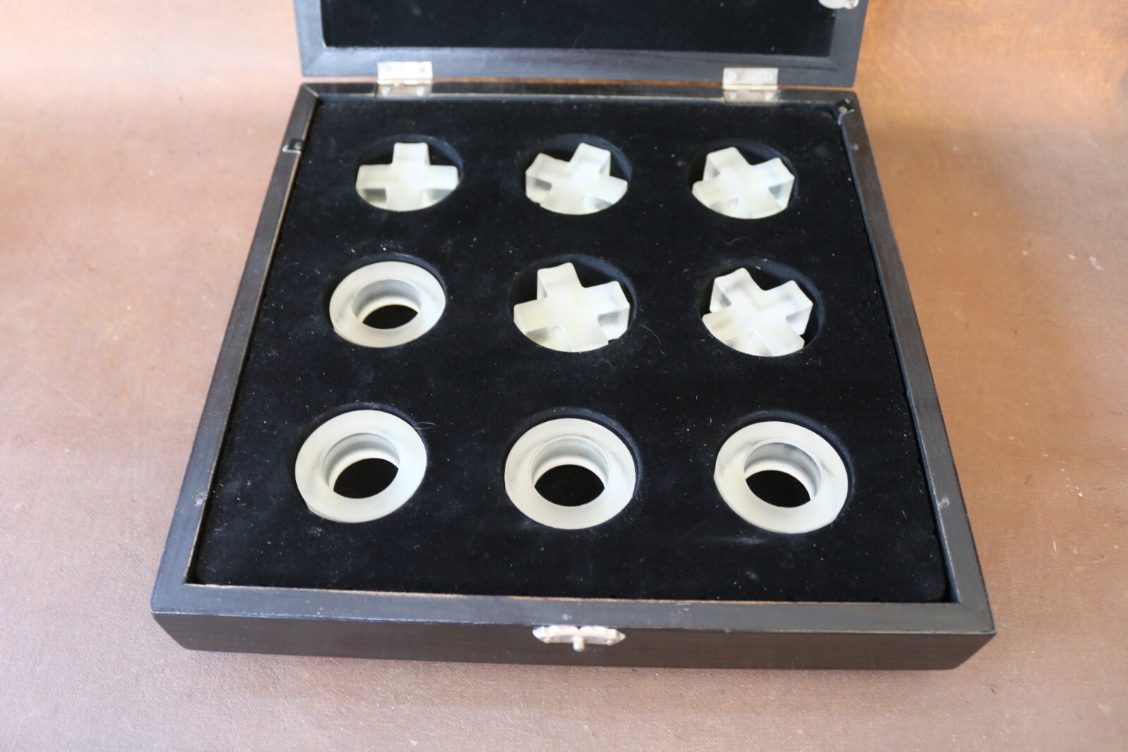 Tic-Tac-Toe Board Game featuring acrylic tokens with a storage mirrored board