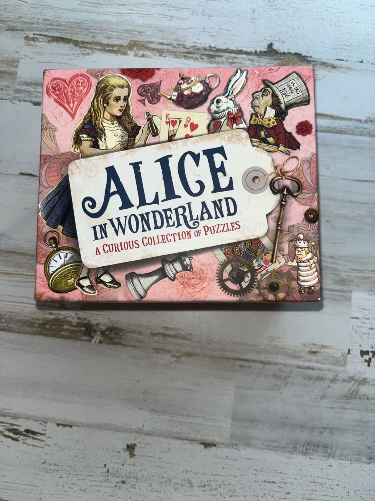 Sterling Innovation Alice in Wonderland Collection of Puzzles Trivia Game Open