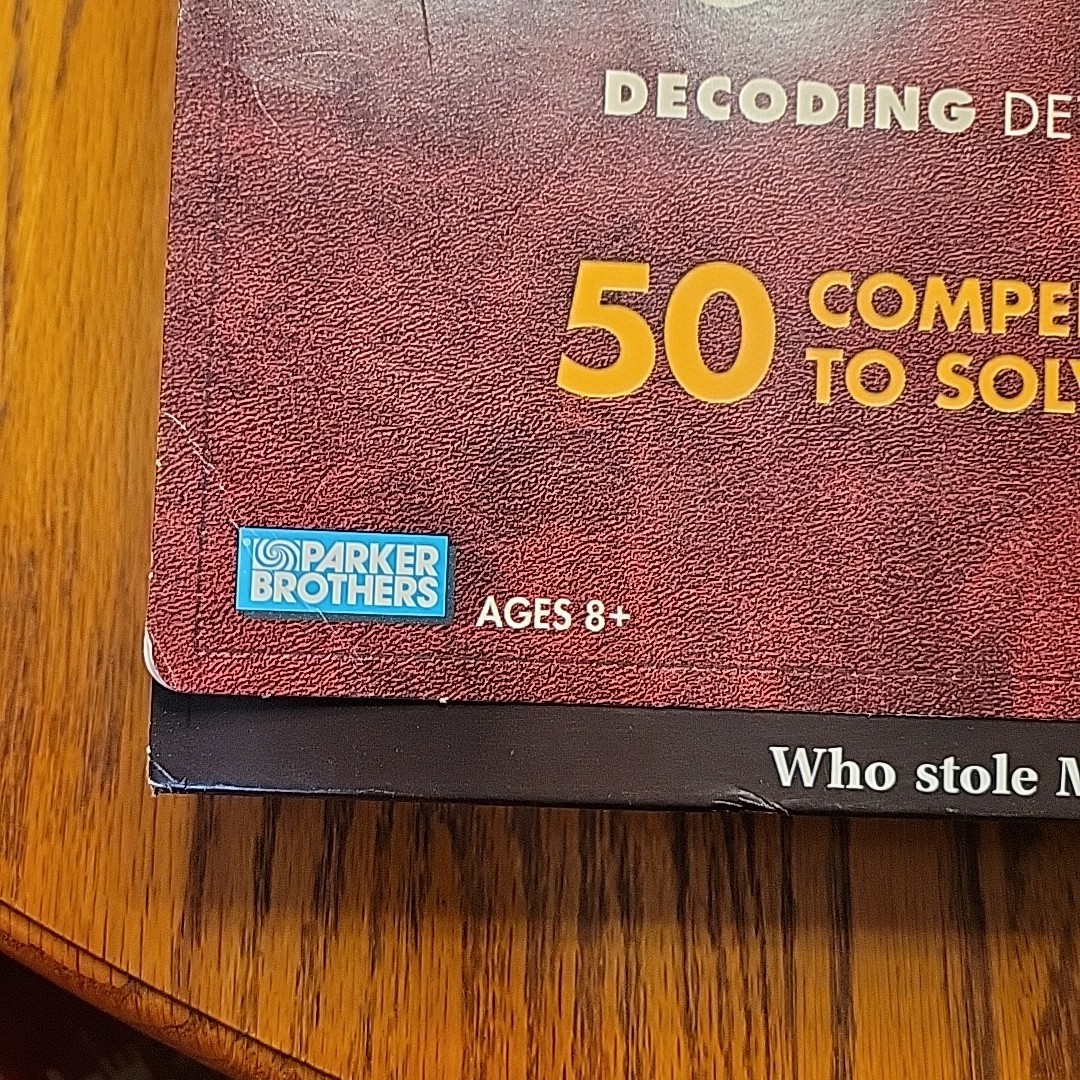 2005 CLUE Mysteries Decoding Detective Board Game New Sealed Box w/Outer Sleeve