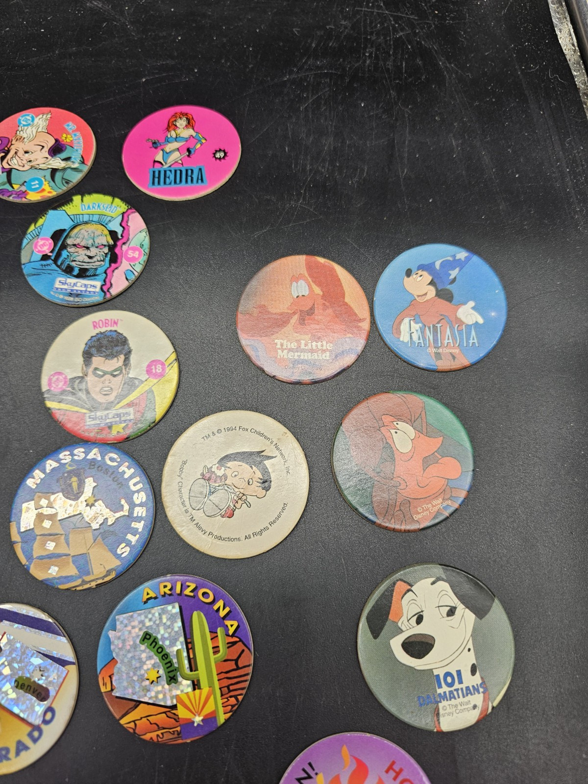 POGS Lot DC comics Sports 8 Ball Disney Poison Red Wings Slammer