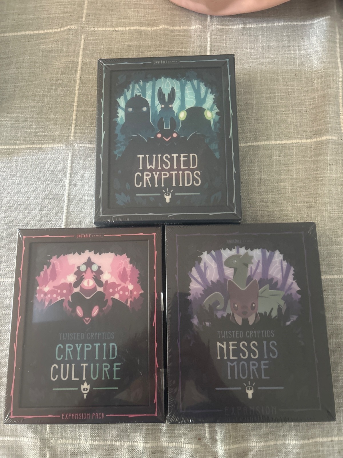 Twisted Cryptids and both the Cryptid Culture and Ness Is More Expansions
