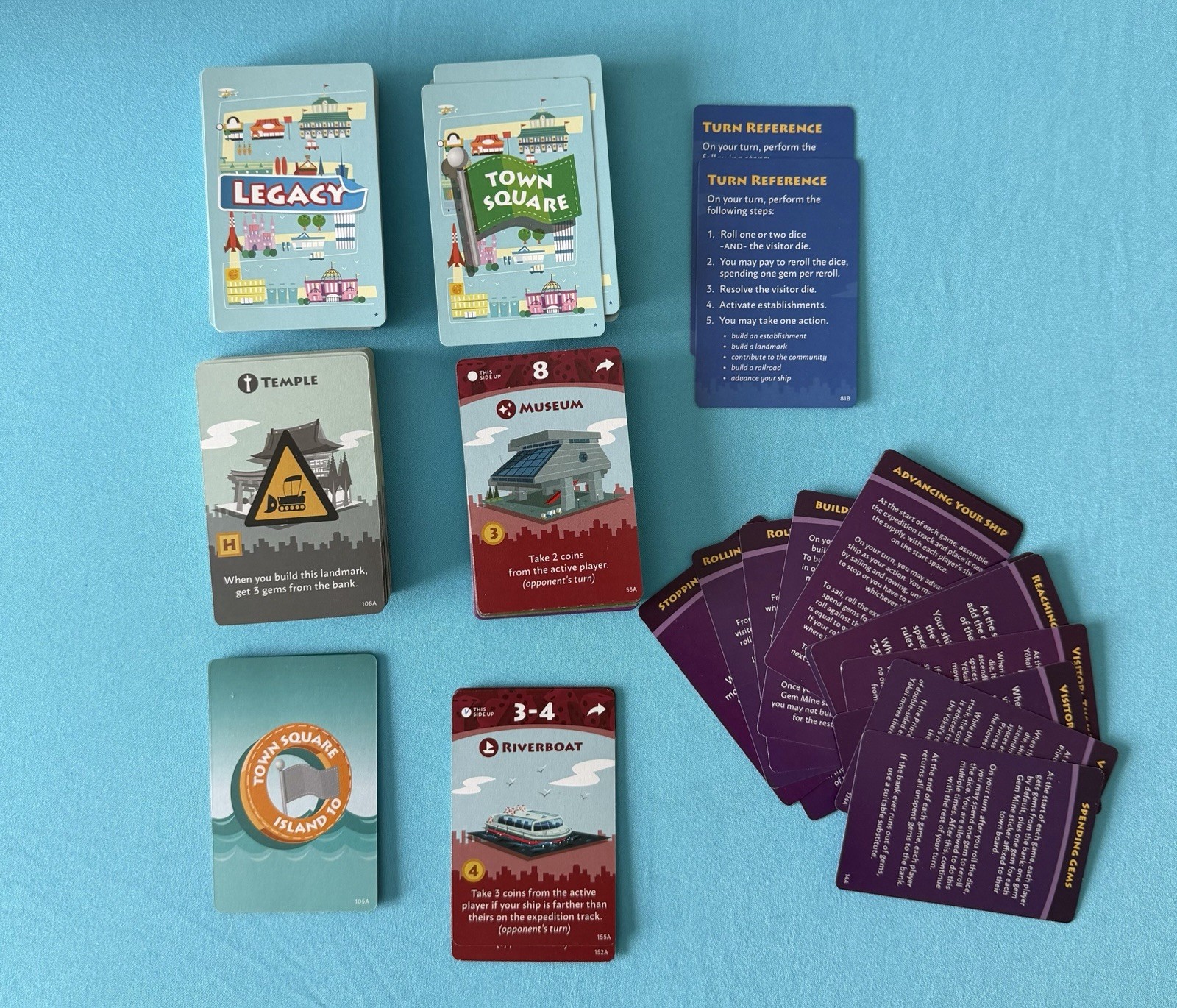 Machi Koro Legacy Board Game, Missing 2 Reference Cards Has 211 Cards Box Damage