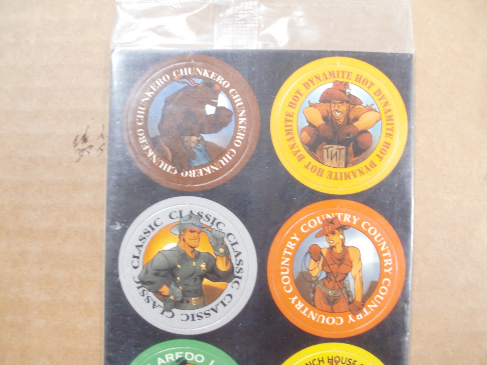 POGS/MILKCAPS STAGG CHILI “LEGENDS OF THE WEST” BY POG. 8 UP CARDED IN WRAP