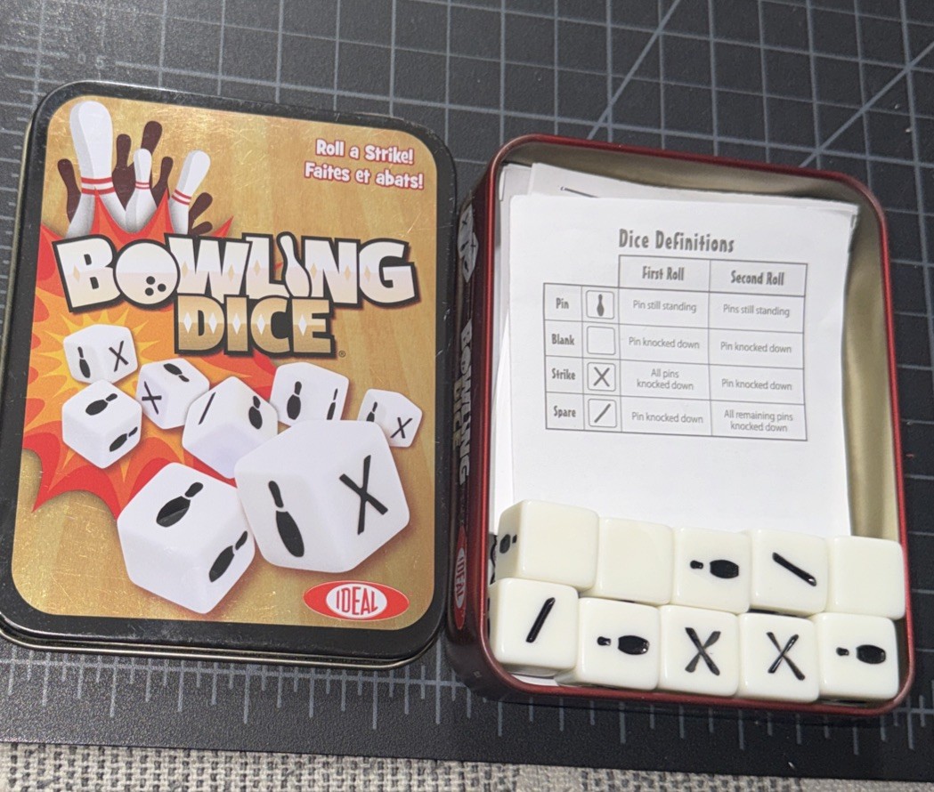 IDEAL Bowling Dice Game – 10 Dice & Score Pad in Tin Container – 2013
