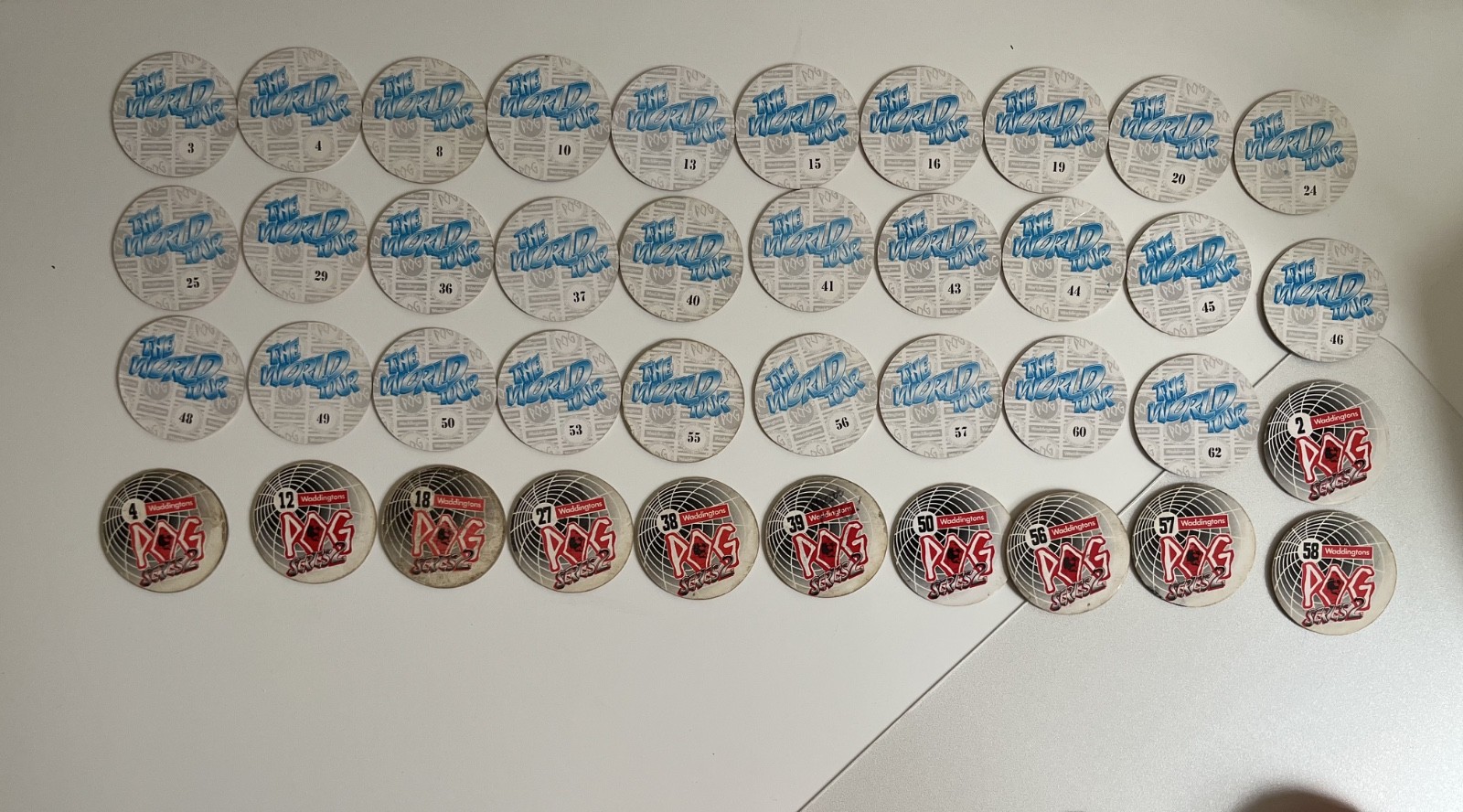 Lot of 40 Pogs, 2 Slammers, Tube, Authentic World Pog Federation all different