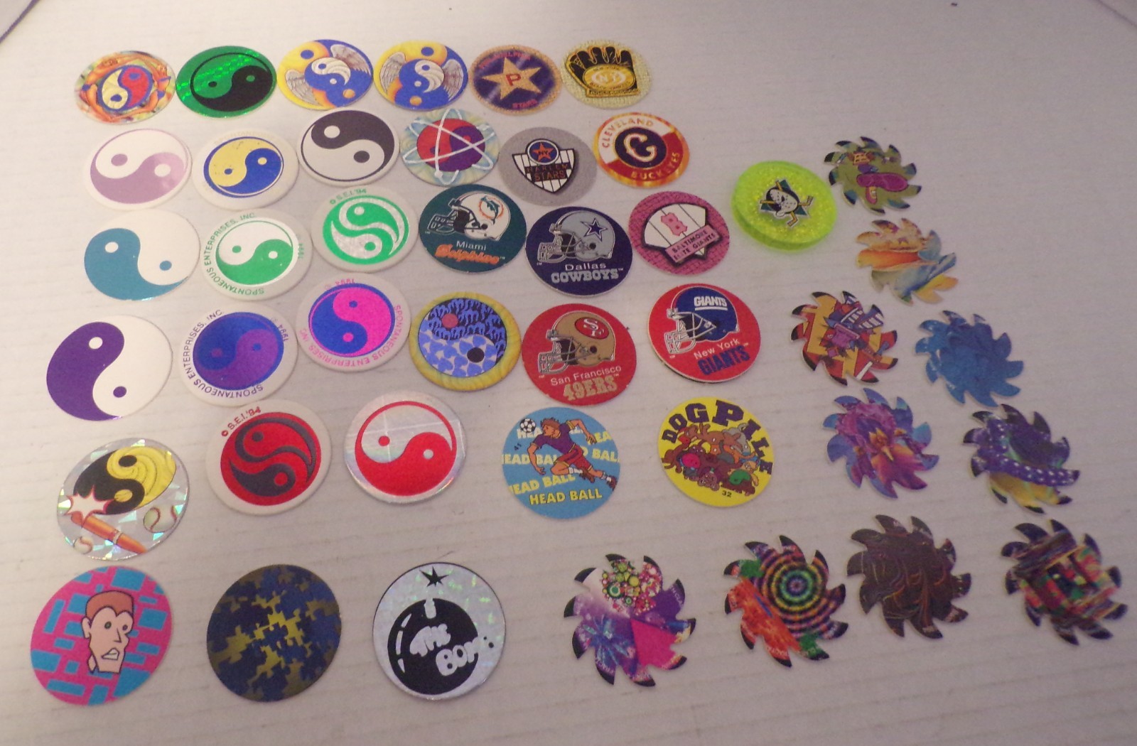 Team Logo Pogs w 49er’s Yankees, Dolphins ++ Saw Blades, Ying Yang