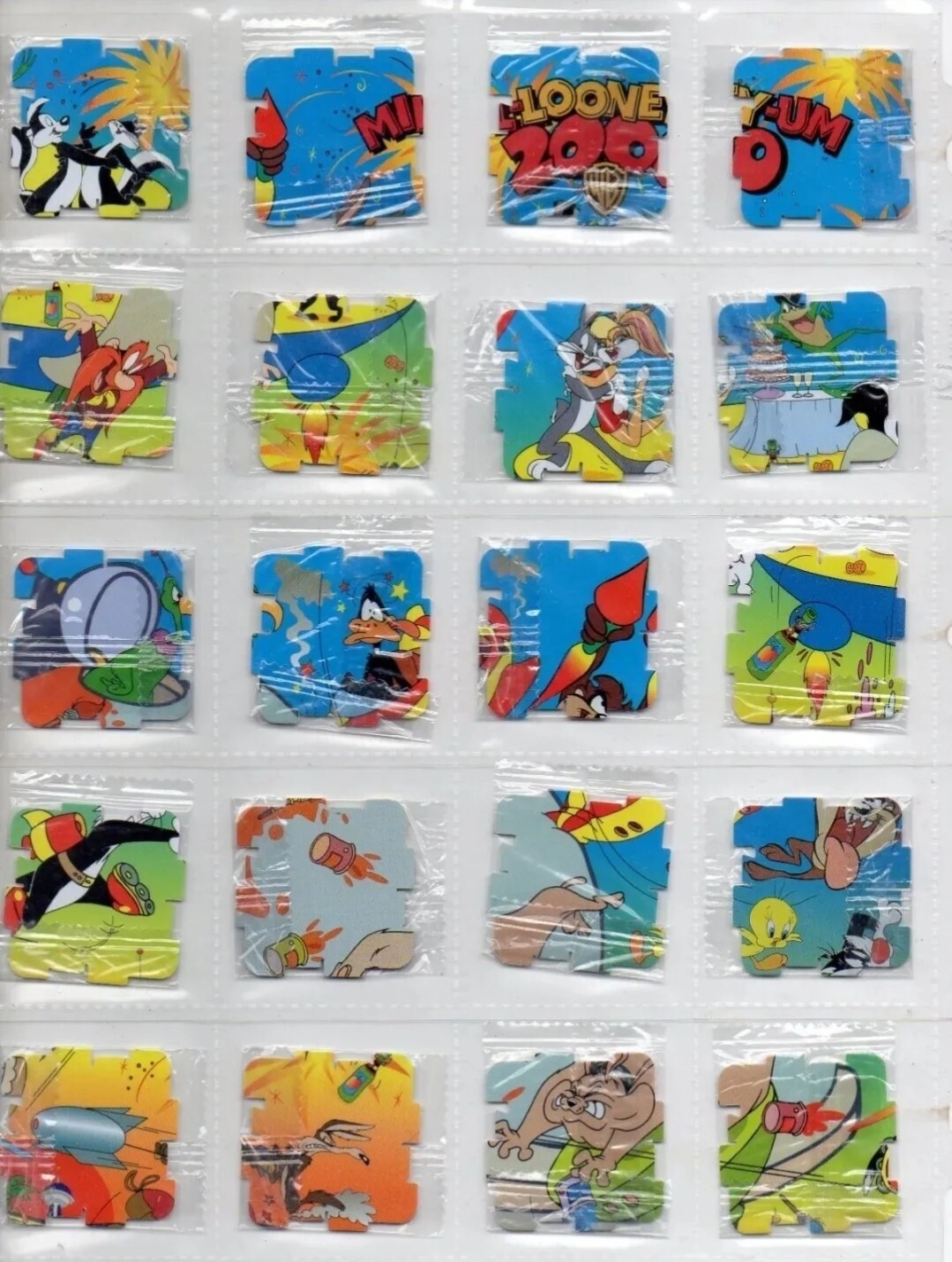 Walkers Looney Tunes Qubix Tazos – Complete set of 36 Tazos – year 2000 Sealed
