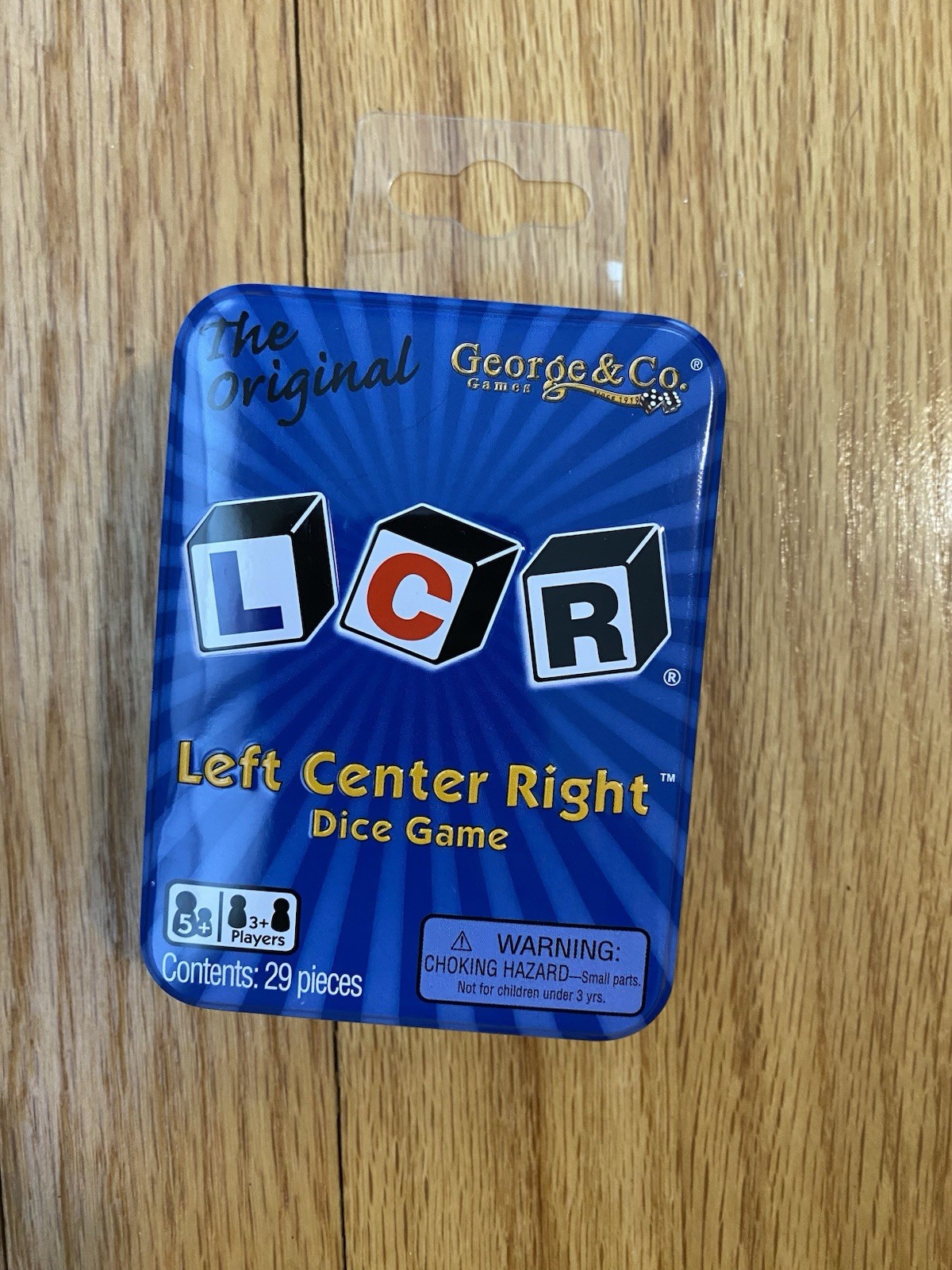 Brand New! LCR® Left Center Right™ Dice Game – Blue Tin Packaging