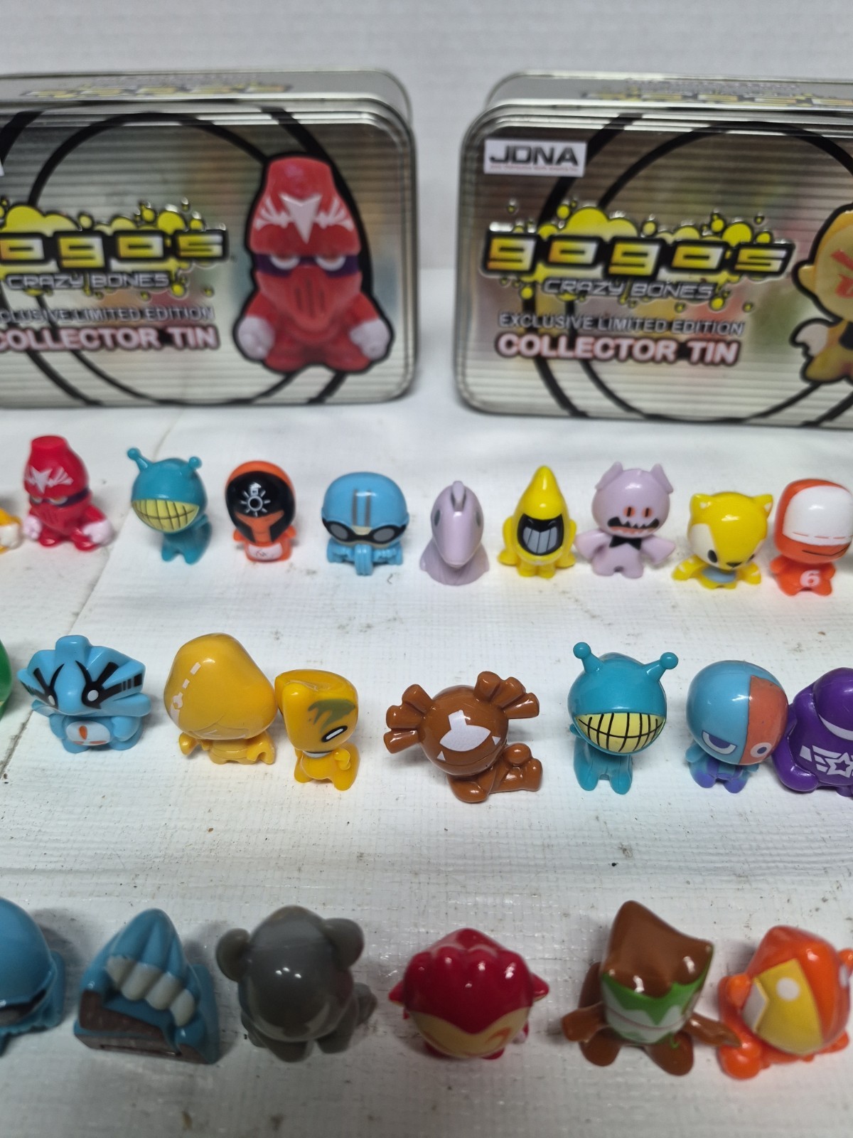 2010 JONA Gogo’s Crazy Bones Exclusive Ltd Edition Collector Tins 78 Figurines