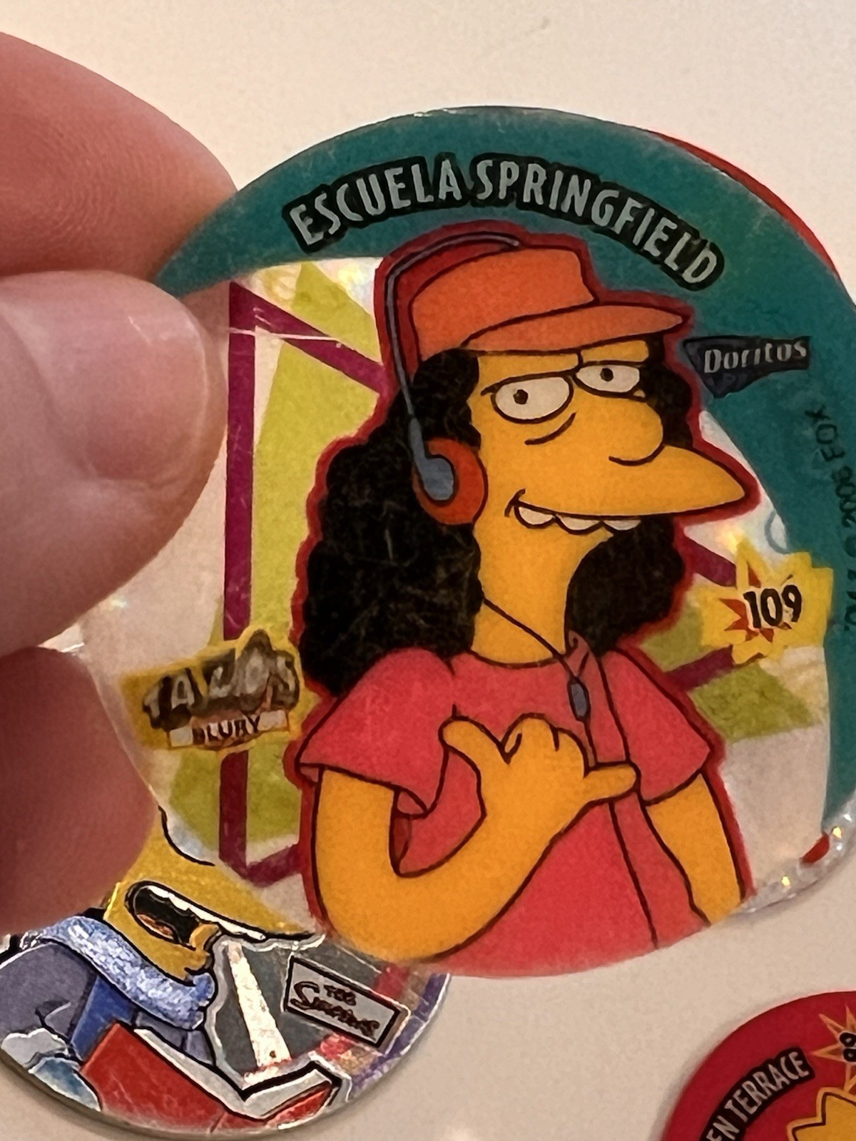 Rare Lot 12 Mexico THE SIMPSONS Tazos Moe Otto Todd Clear Shiny Collector Pogs