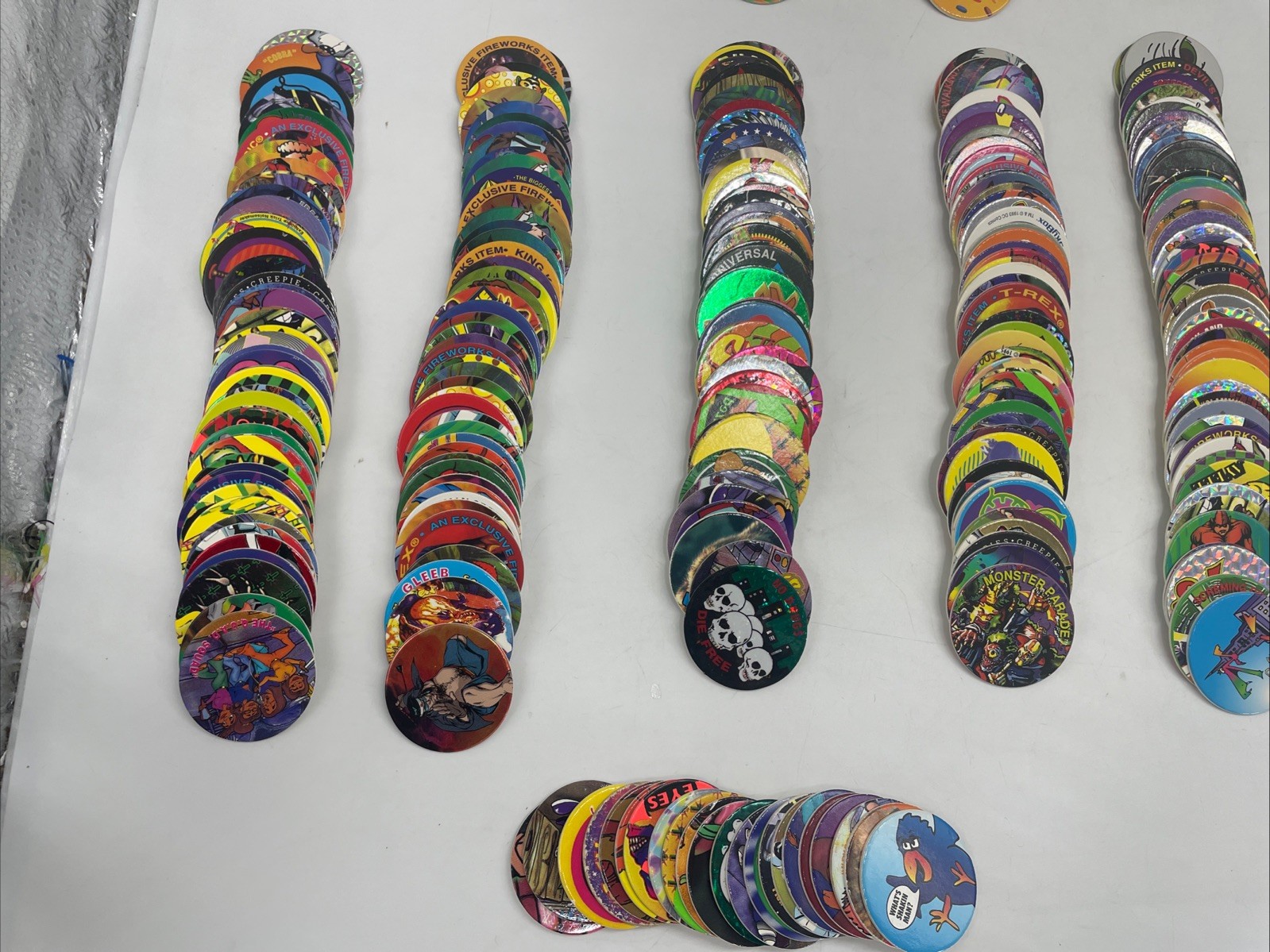 Large POGS Lot (825+ Milk Caps, 130+ Slammers, 10 Game Pads, 13 Tubes)