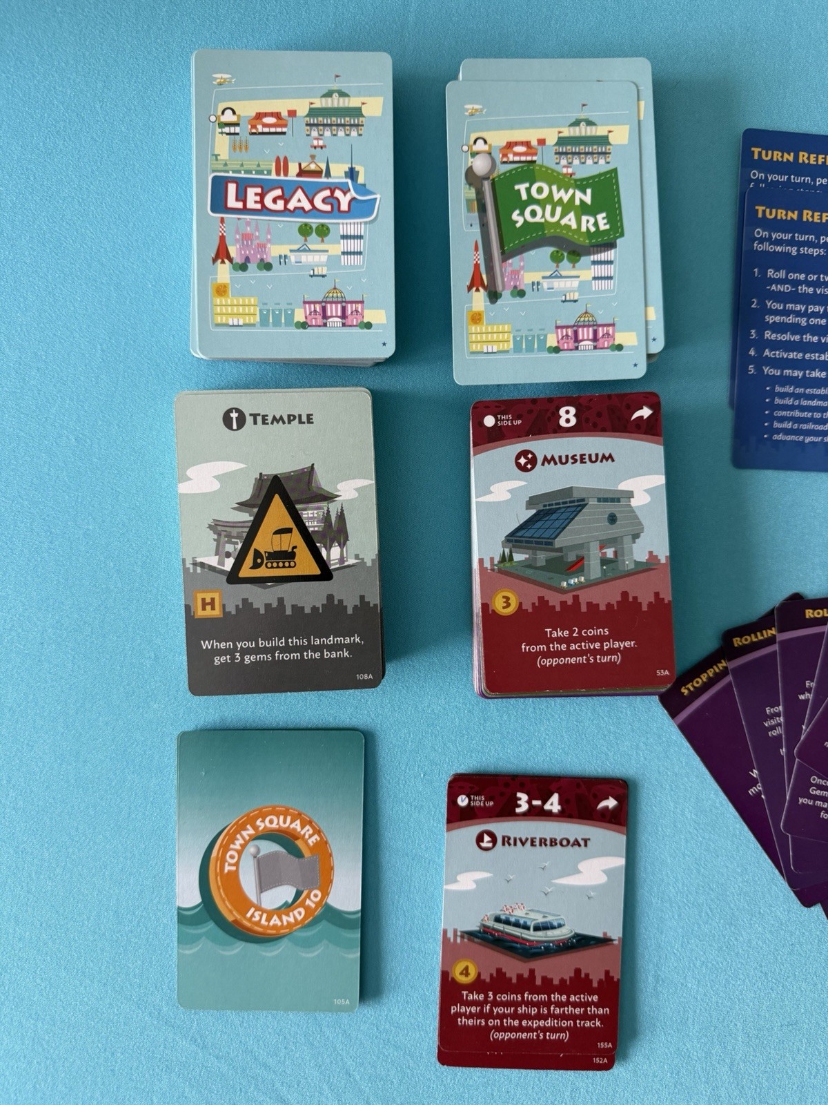 Machi Koro Legacy Board Game, Missing 2 Reference Cards Has 211 Cards Box Damage