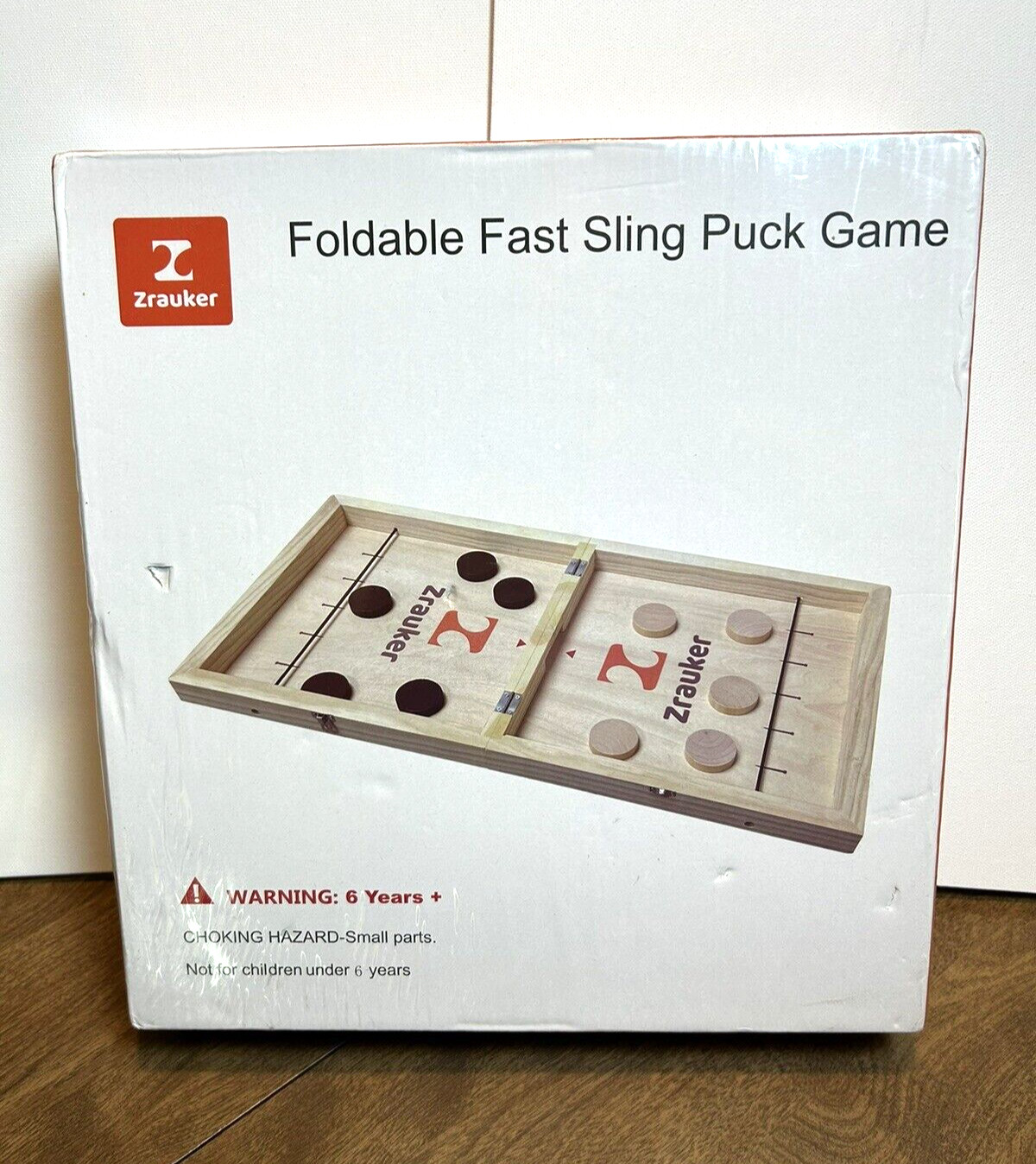 Foldable Wooden Fast Sling Puck & Chess Game. New game with light damage to box