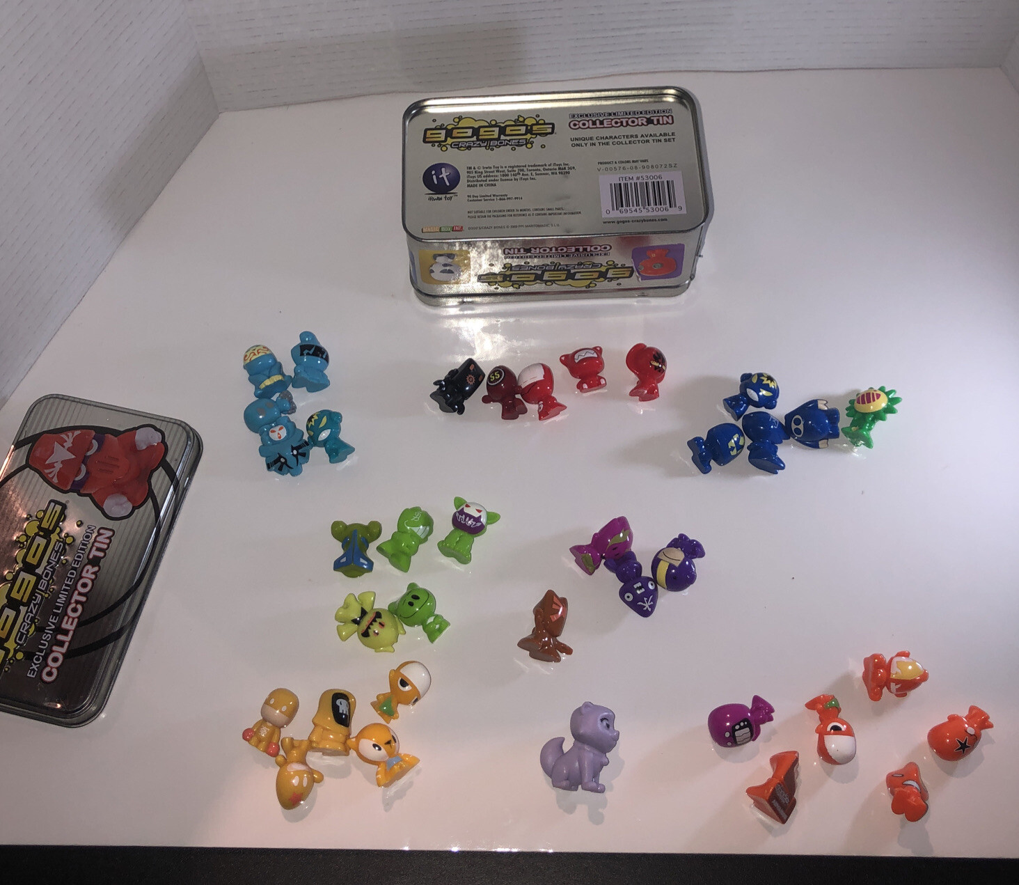 Gogos’ Crazy Bones Figures x 35 Lot Bundle and tin with stickers on it. see pic.