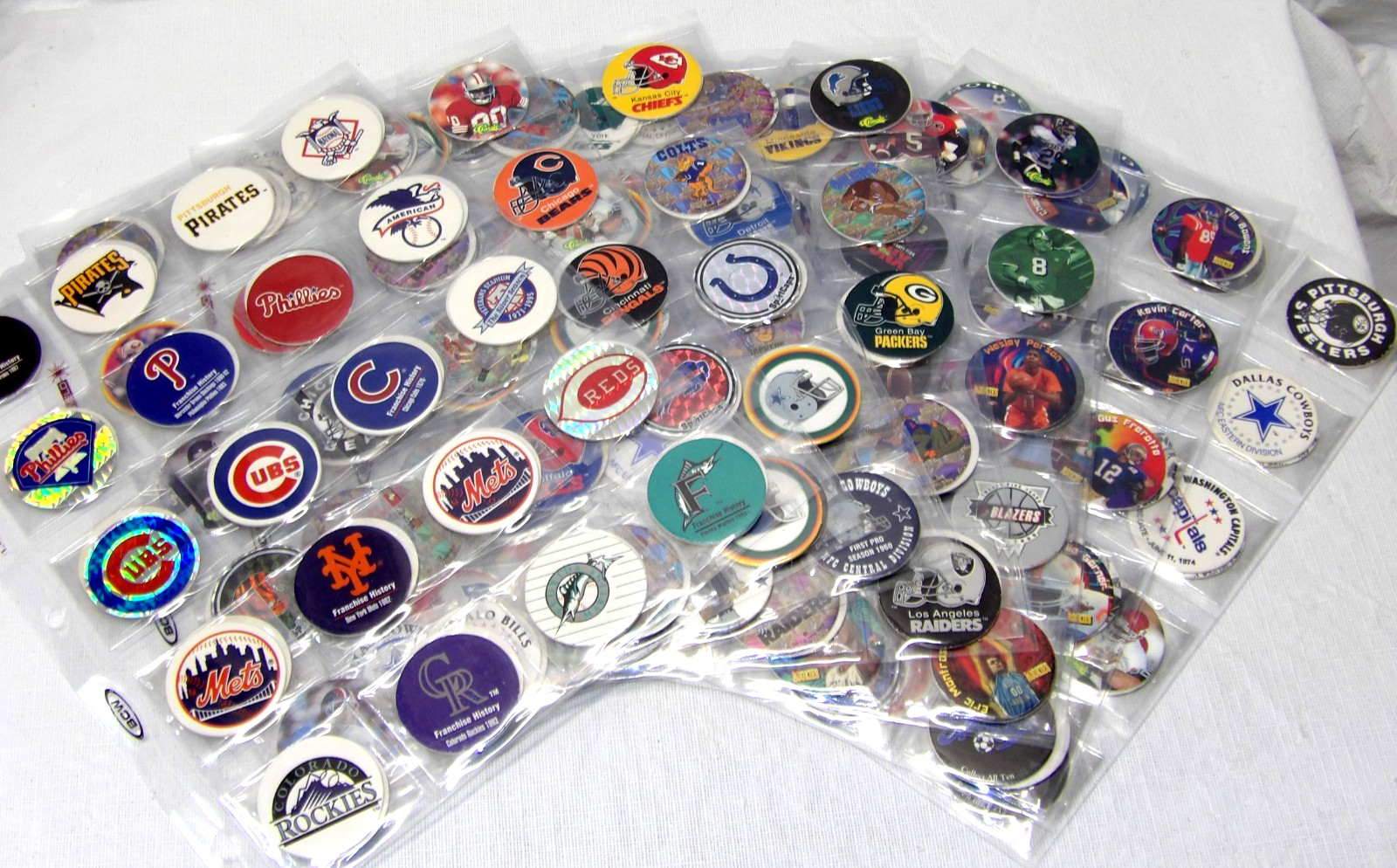 Pogs!• Sports Themed!• 280 Wrapped/Sleeved Pogs!• NFL• NBA• MLB• NHL• FIFA•