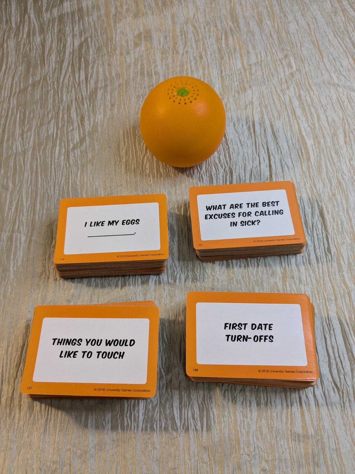 Orange Toss An Adult Party Game by University Games 2016 Timed Card Game 18+