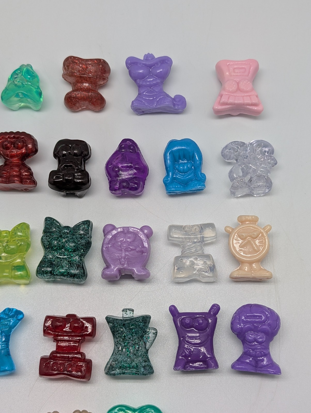 Lot of 25 Miscellaneous Crazy Bones from 1998 on – Things, Sports +more!
