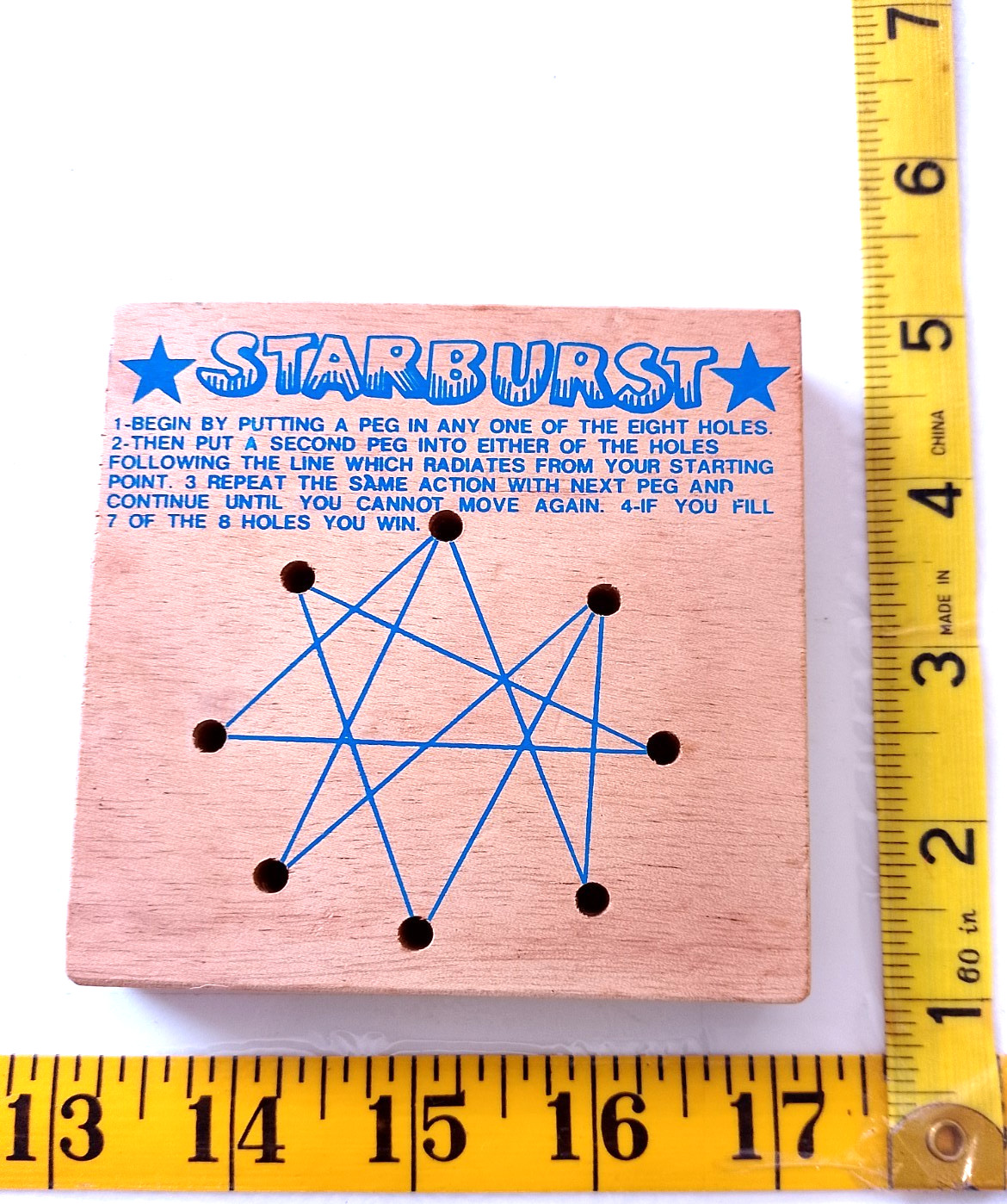 Vintage Starburst wooden peg board game brain teaser