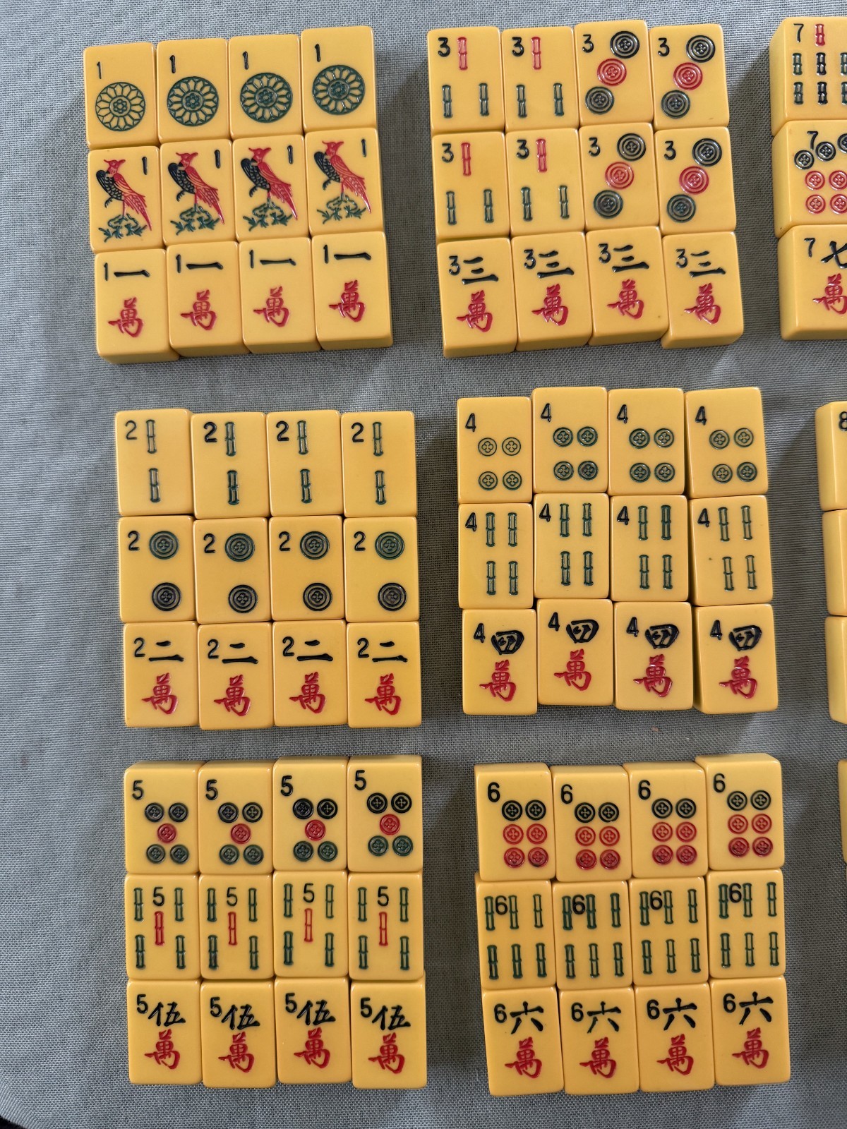 Vintage Mahjong Set Butterscotch Bakelite Tiles & 4 Multicolor Racks