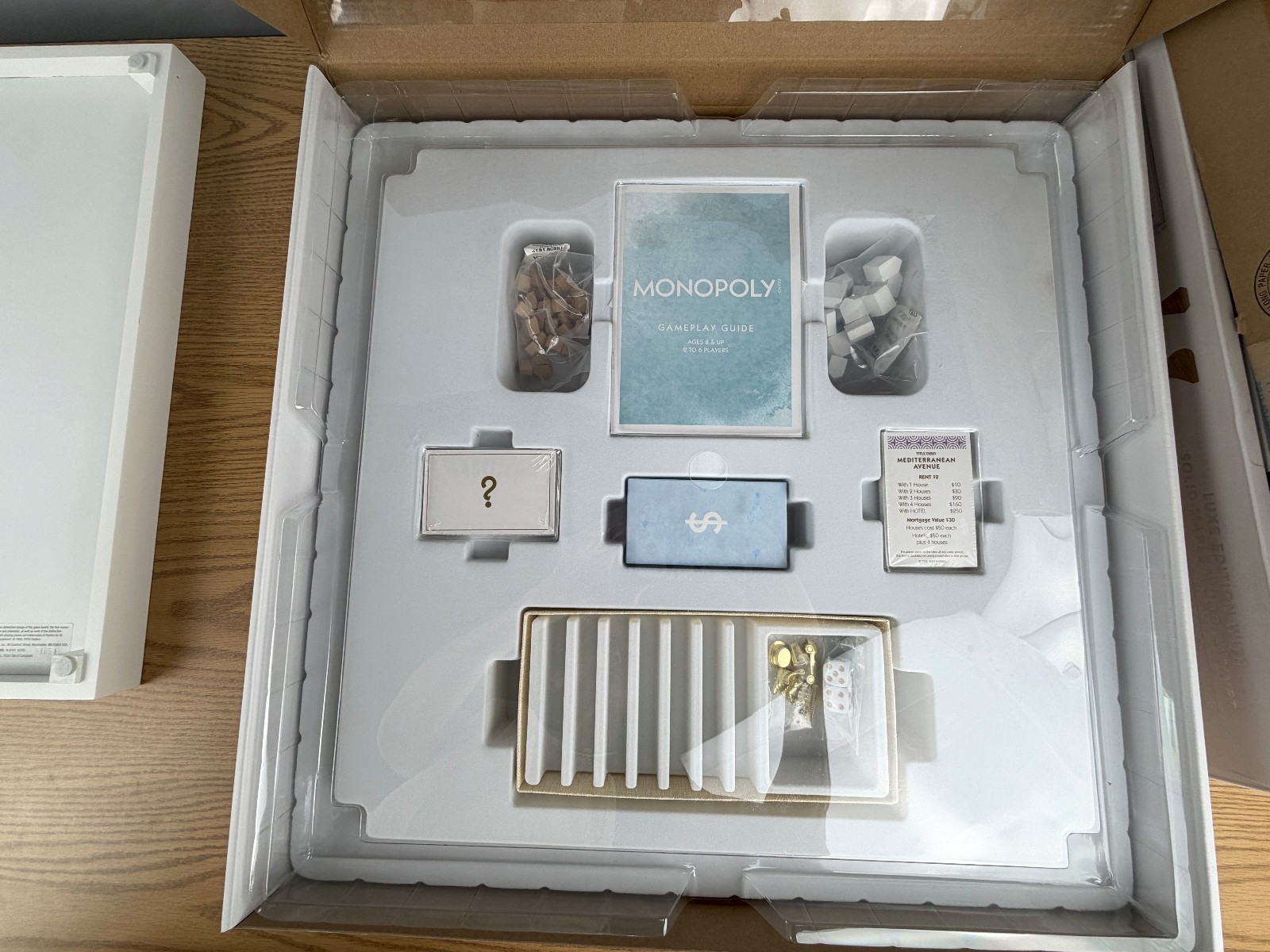 WS Game Co Monopoly Bianco Edition with Foil-Stamped Wood Game Board Open Box