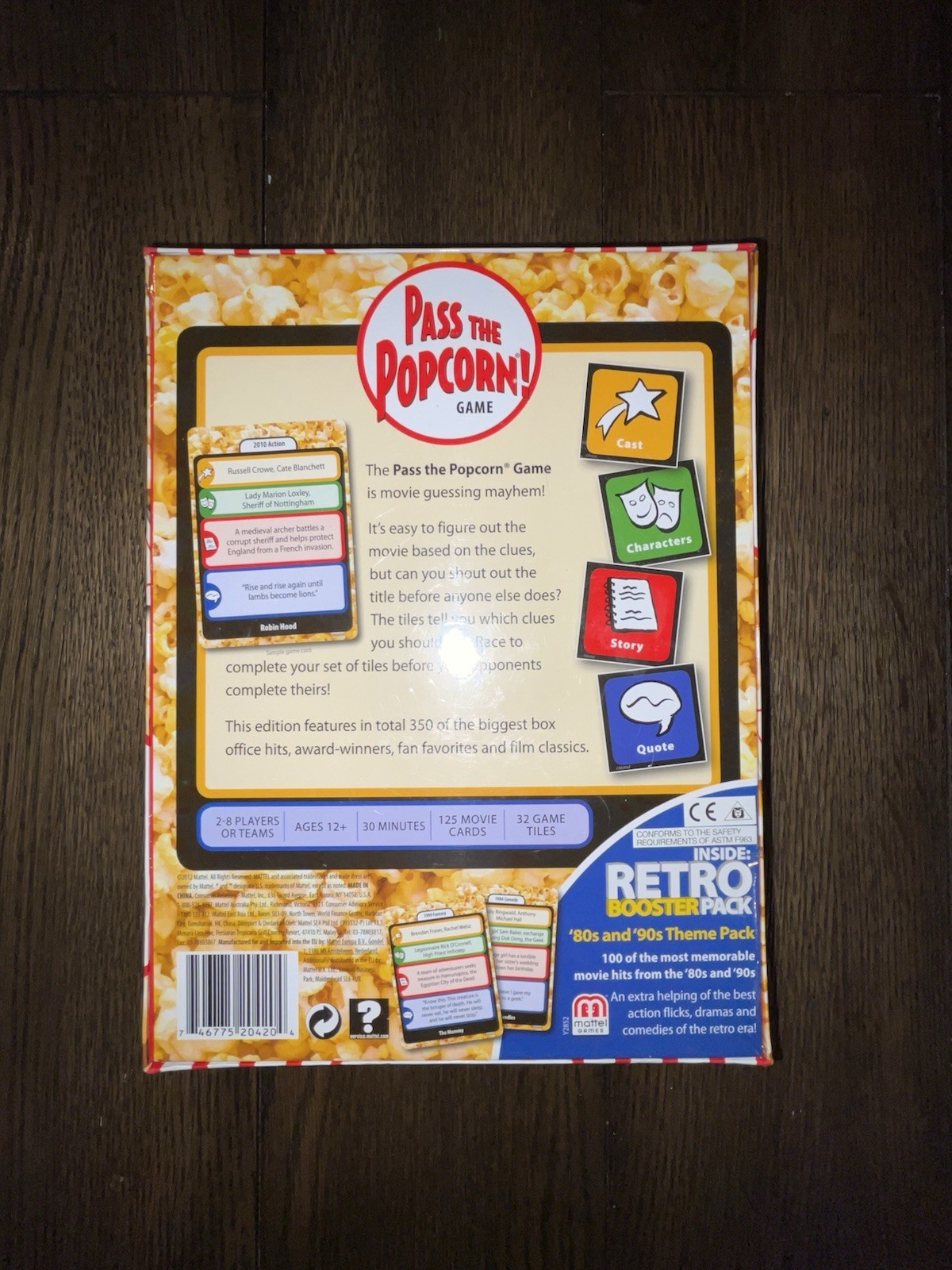 Mattel – Pass the Popcorn (Movie Trivia Family Party Game) – New / Sealed