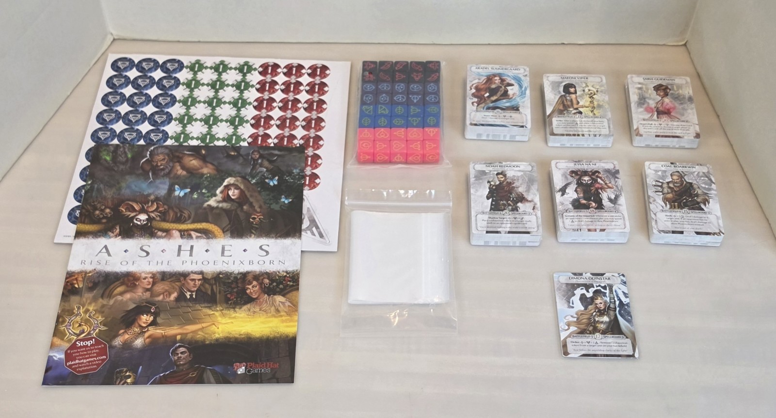 Ashes Reborn: Rise of the Phoenixborn Board Game by Plaid Hat Games Open Box