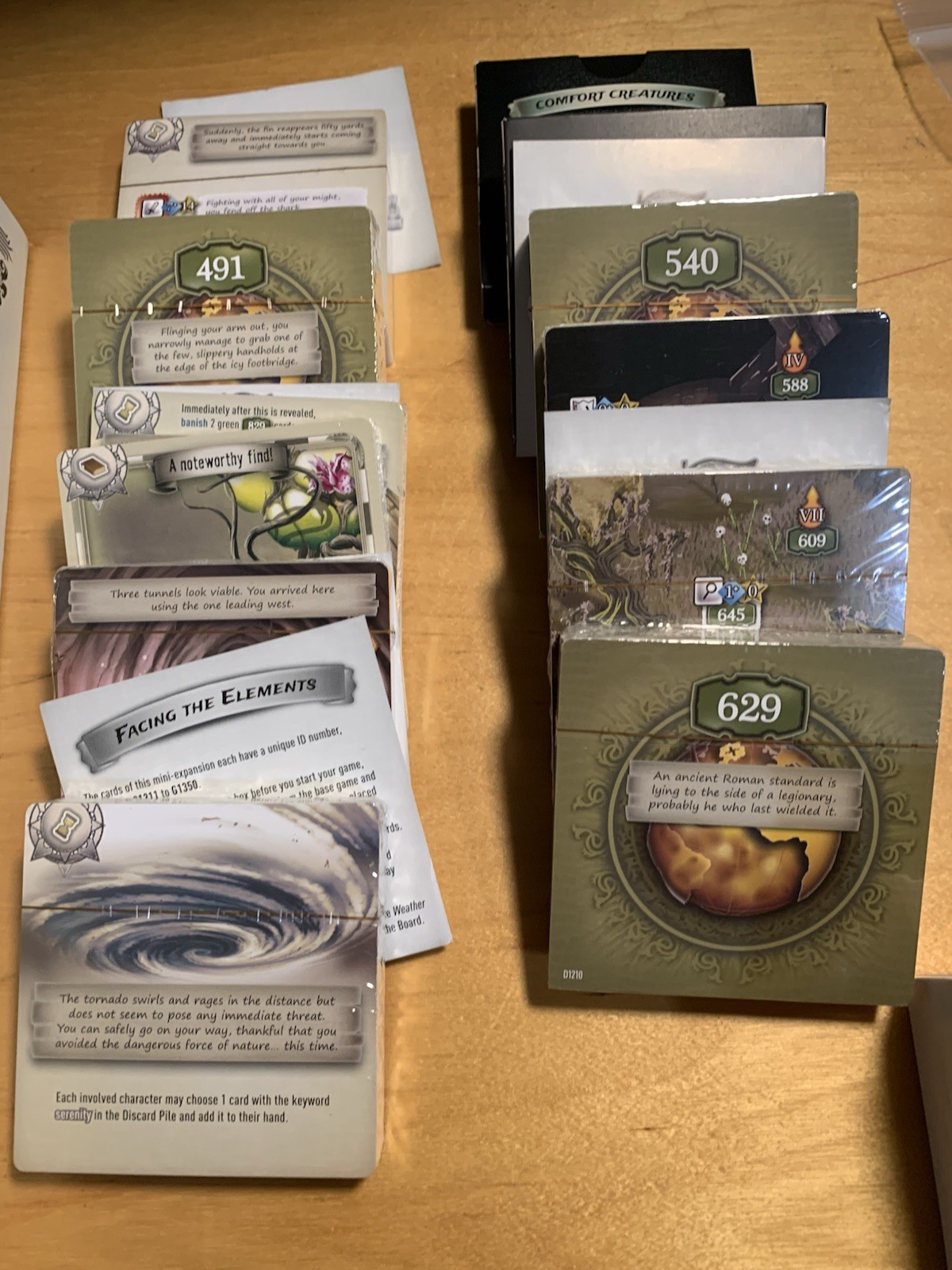 The 7th Continent Board Game + What Goes Up Expansion, Kickstarter Versions