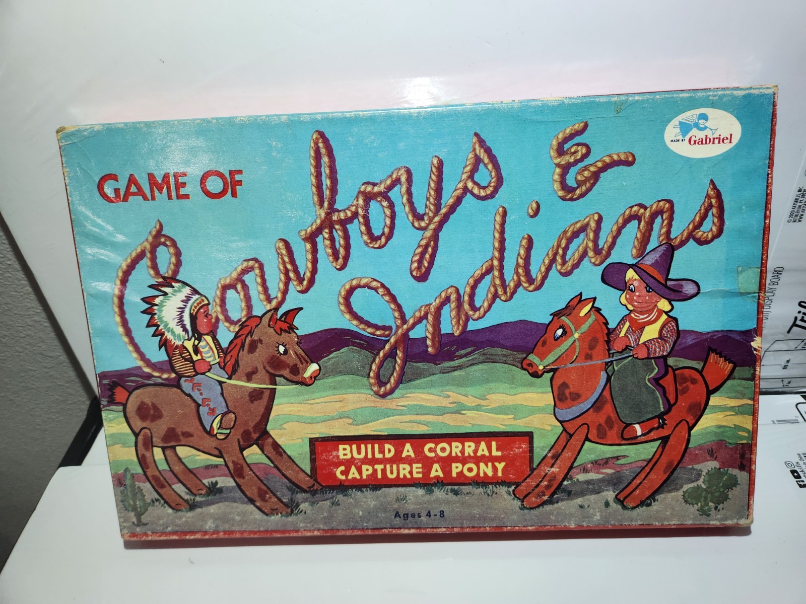 GAME OF COWBOYS AND INDIANS 1950 SAML GABRIEL SONS GREAT GRAPHICS WOODEN PIECES
