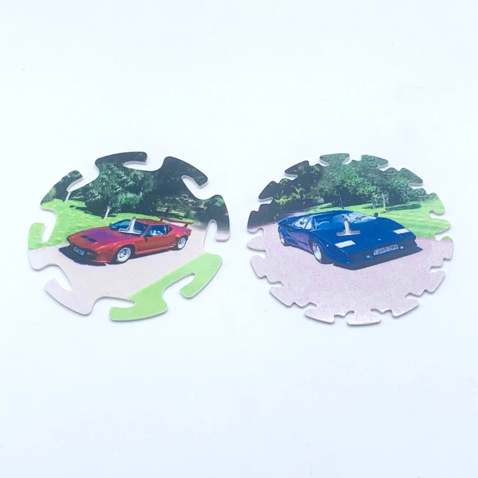 Lot of 2 Tazos Spinners Sports Cars De Tomaso Pantera Lamborghini Countach POGs