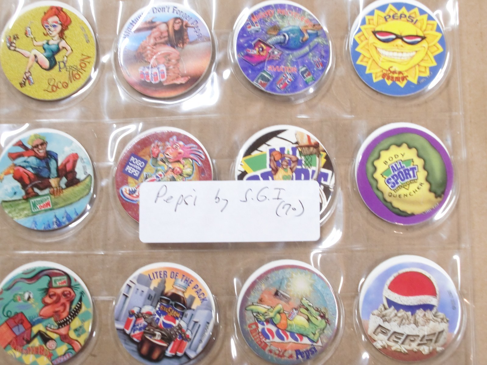 POGS/MILKCAPS PEPSI BY S.G.I. 1995 REGULAR ISSUE COMPLETE SET OF ALL 70 SHEETED