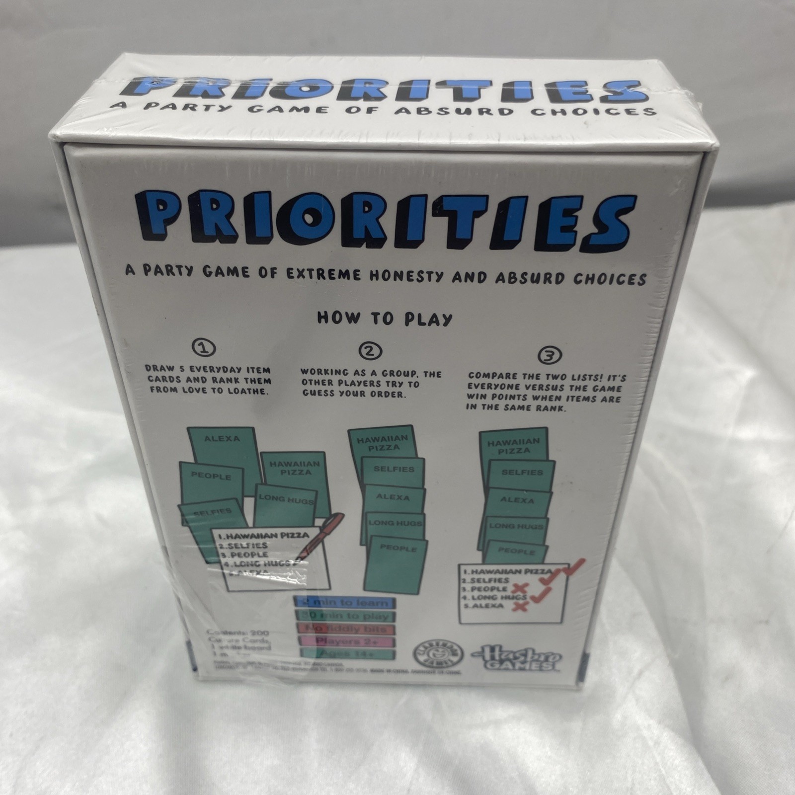 Hasbro Games Priorities Party Game Hilarious Game Of Absurd Choices