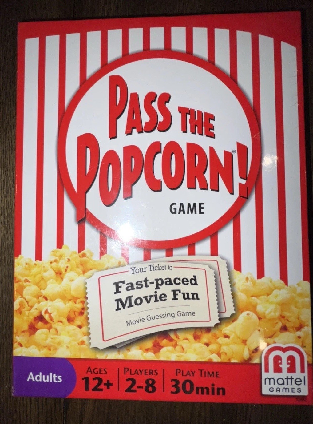Mattel – Pass the Popcorn (Movie Trivia Family Party Game) – New / Sealed