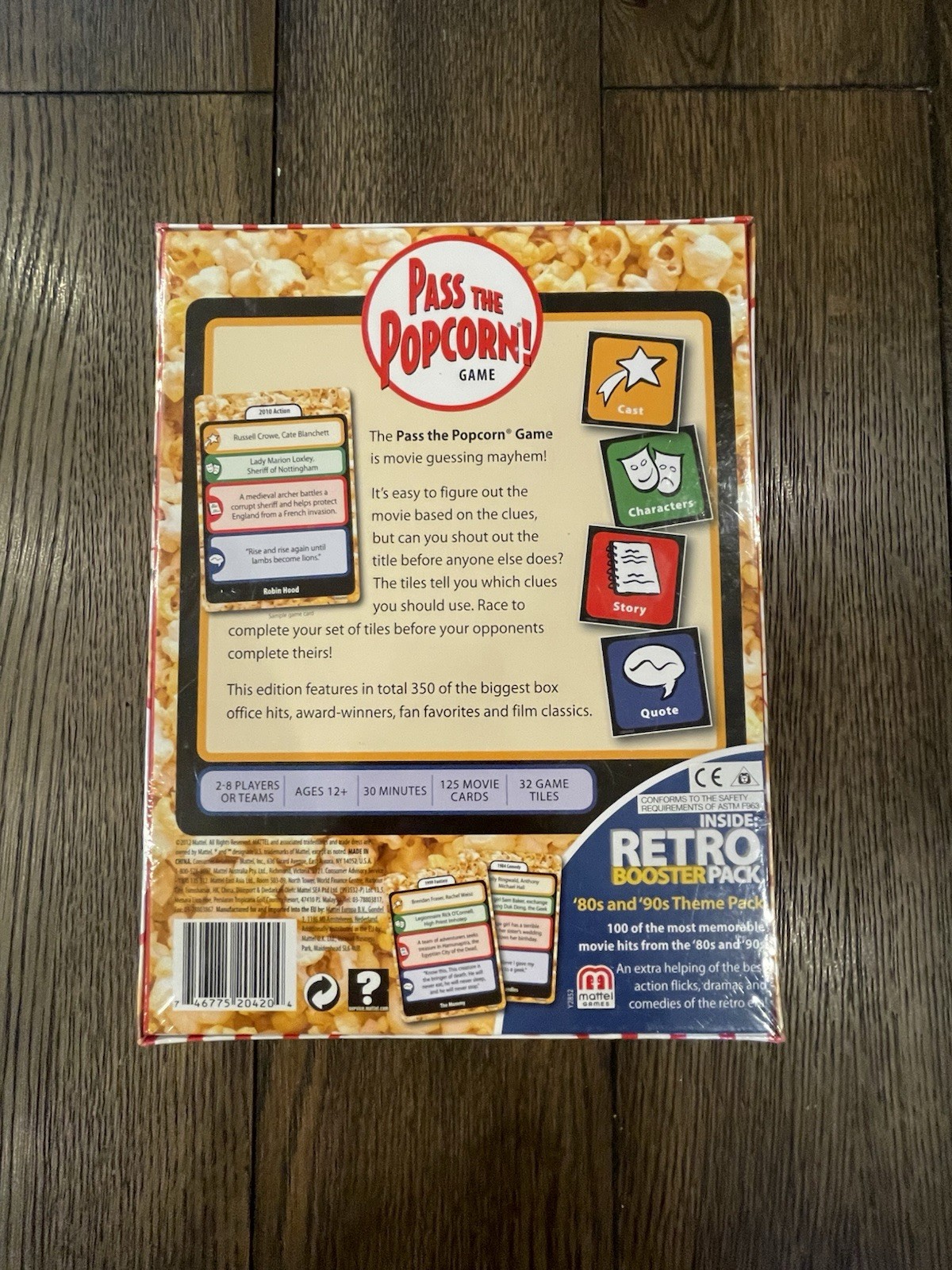 Mattel – Pass the Popcorn (Movie Trivia Family Party Game) – New / Sealed