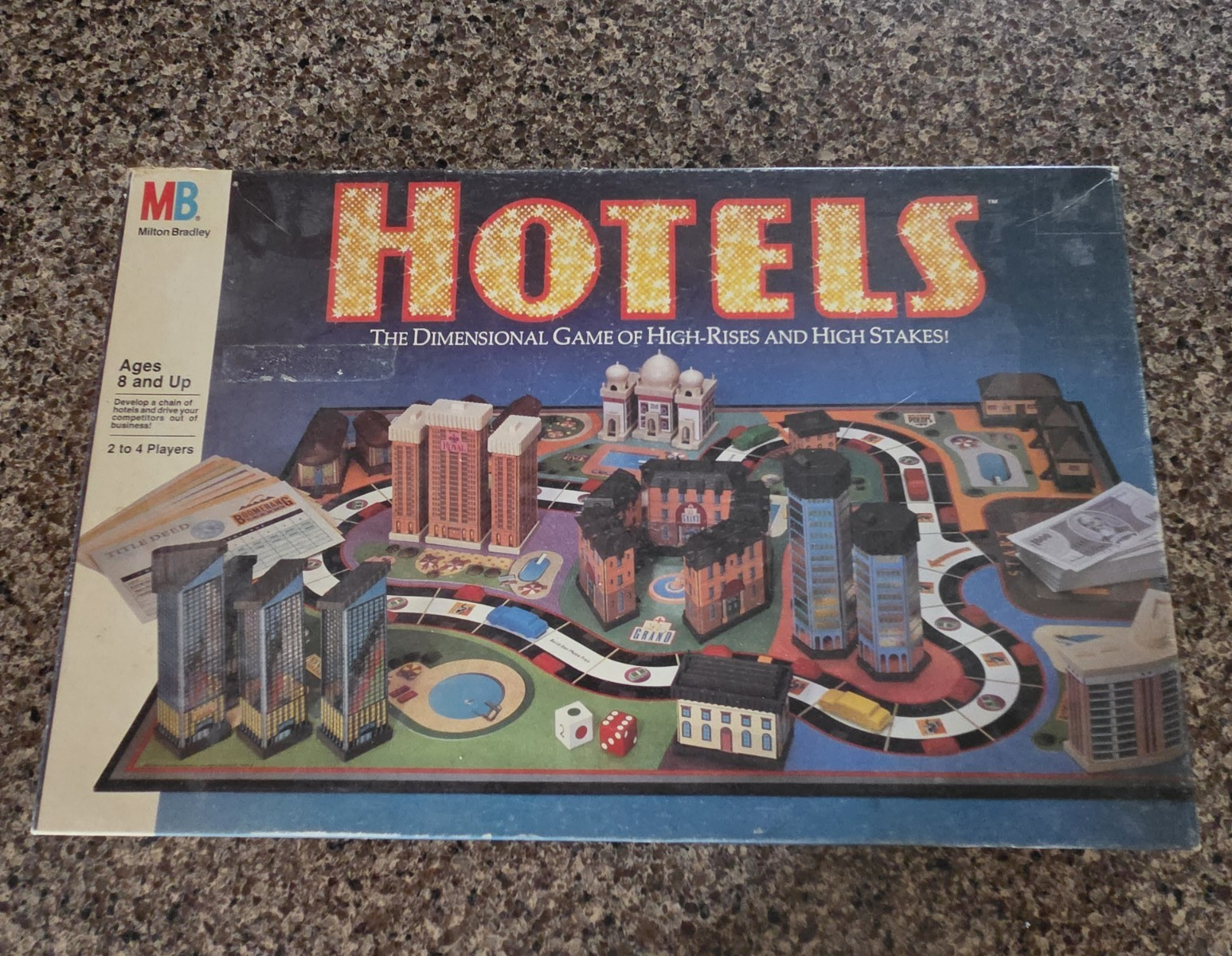 Milton Bradley Hotels Game w/all 3-D Buildings & Dice, Money, 2 Cars, Pools