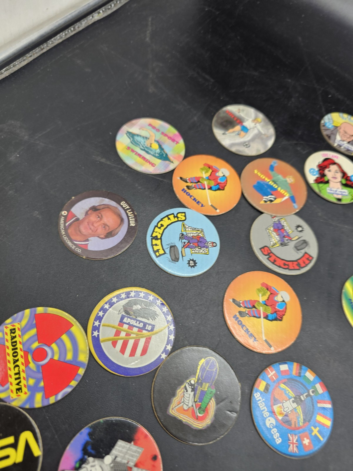 POGS Lot DC comics Sports 8 Ball Disney Poison Red Wings Slammer