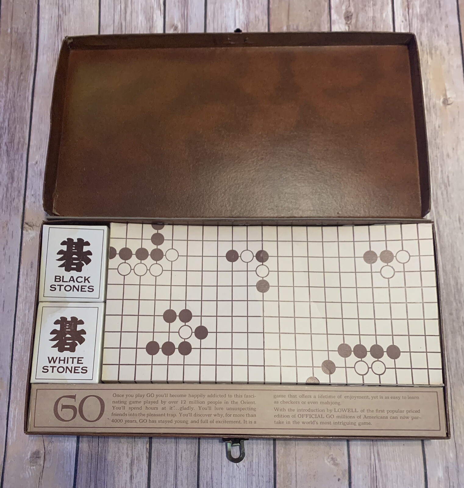 Official Go Classic Game, in fair condition, Lowell Toy Mfg Corp.