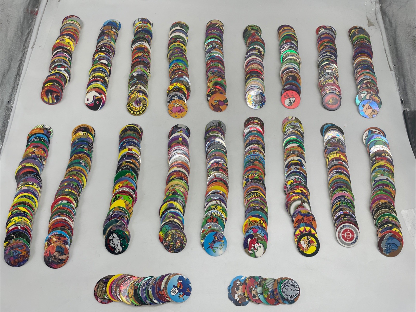 Large POGS Lot (825+ Milk Caps, 130+ Slammers, 10 Game Pads, 13 Tubes)