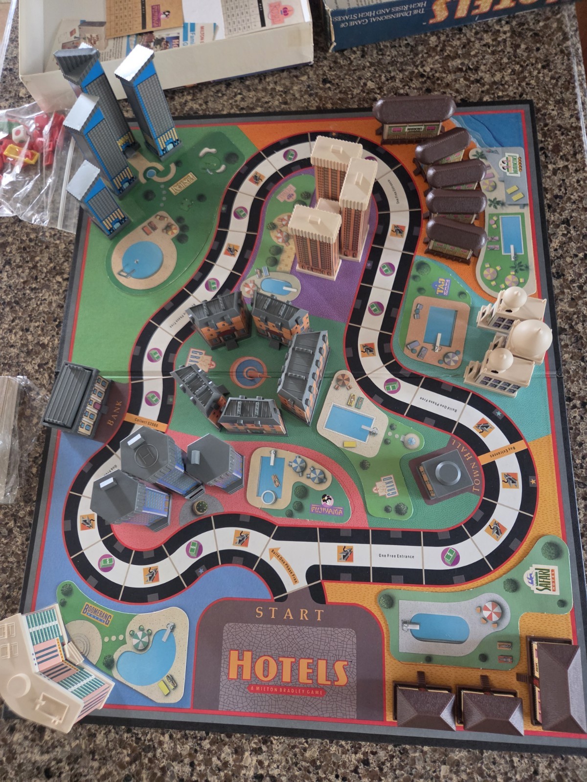 Milton Bradley Hotels Game w/all 3-D Buildings & Dice, Money, 2 Cars, Pools