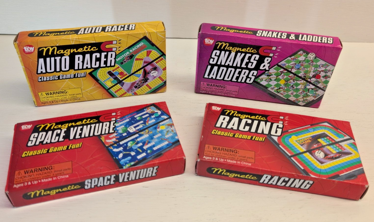 NEW! SET OF 4 TOY NETWORK MAGNETIC TRAVEL GAME SNAKES & LADDERS RACING SPACE