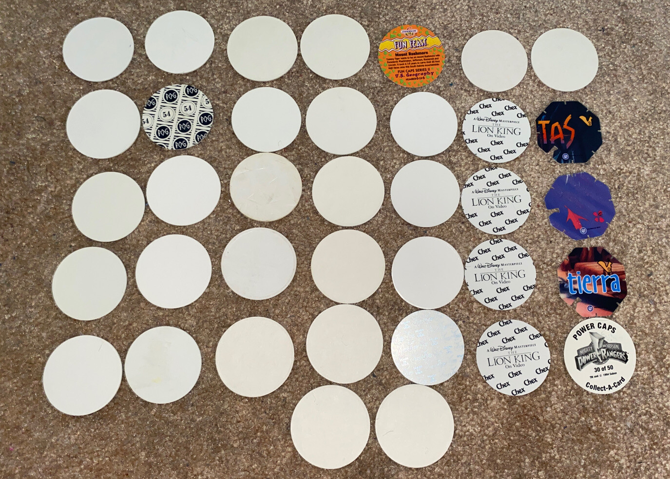 Set of 37 Miscellaneous Pogs 1990s