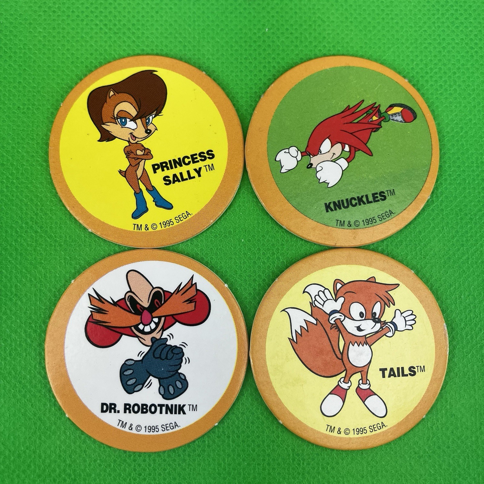Lot of 4 Sonic The Hedgehog Pogs from Sega 1995 Sally Dr Robotnik Tails Knuckles