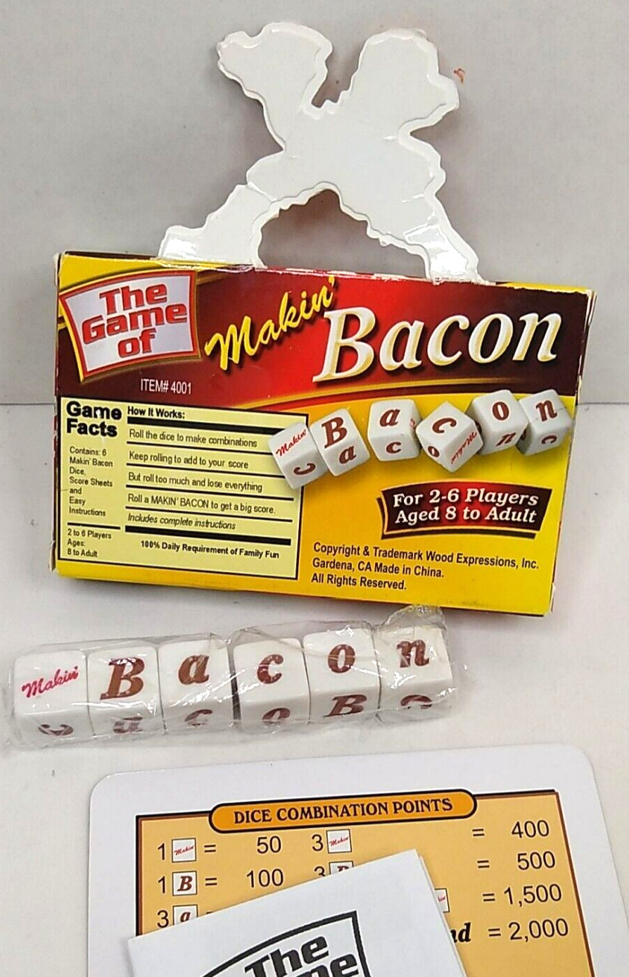 Makin’ Bacon Dice Game 2-6 Players Age 8+ Open box with some flaws